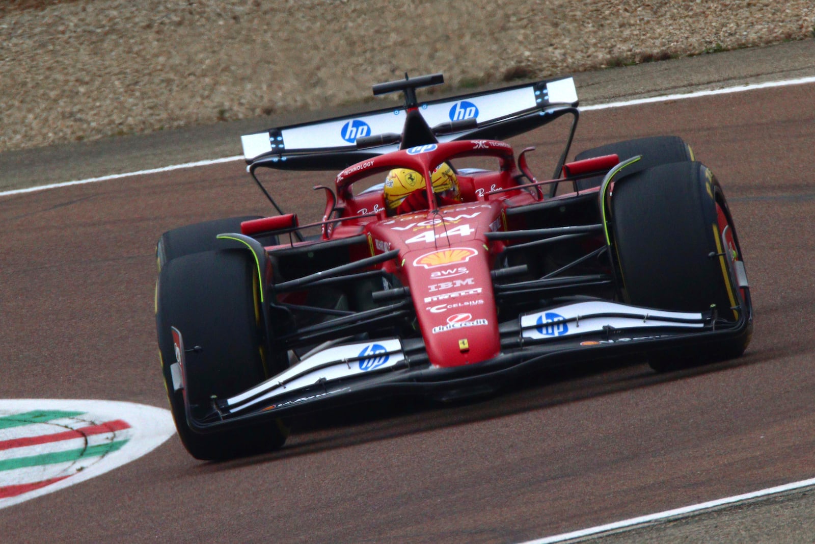 Ferrari driver Lewis Hamilton drives the new Ferrari SF-25 at Fiorano circuit, near Maranello, Italy, Wednesday Feb. 19, 2025. (Davide Gennari/LaPresse via AP)