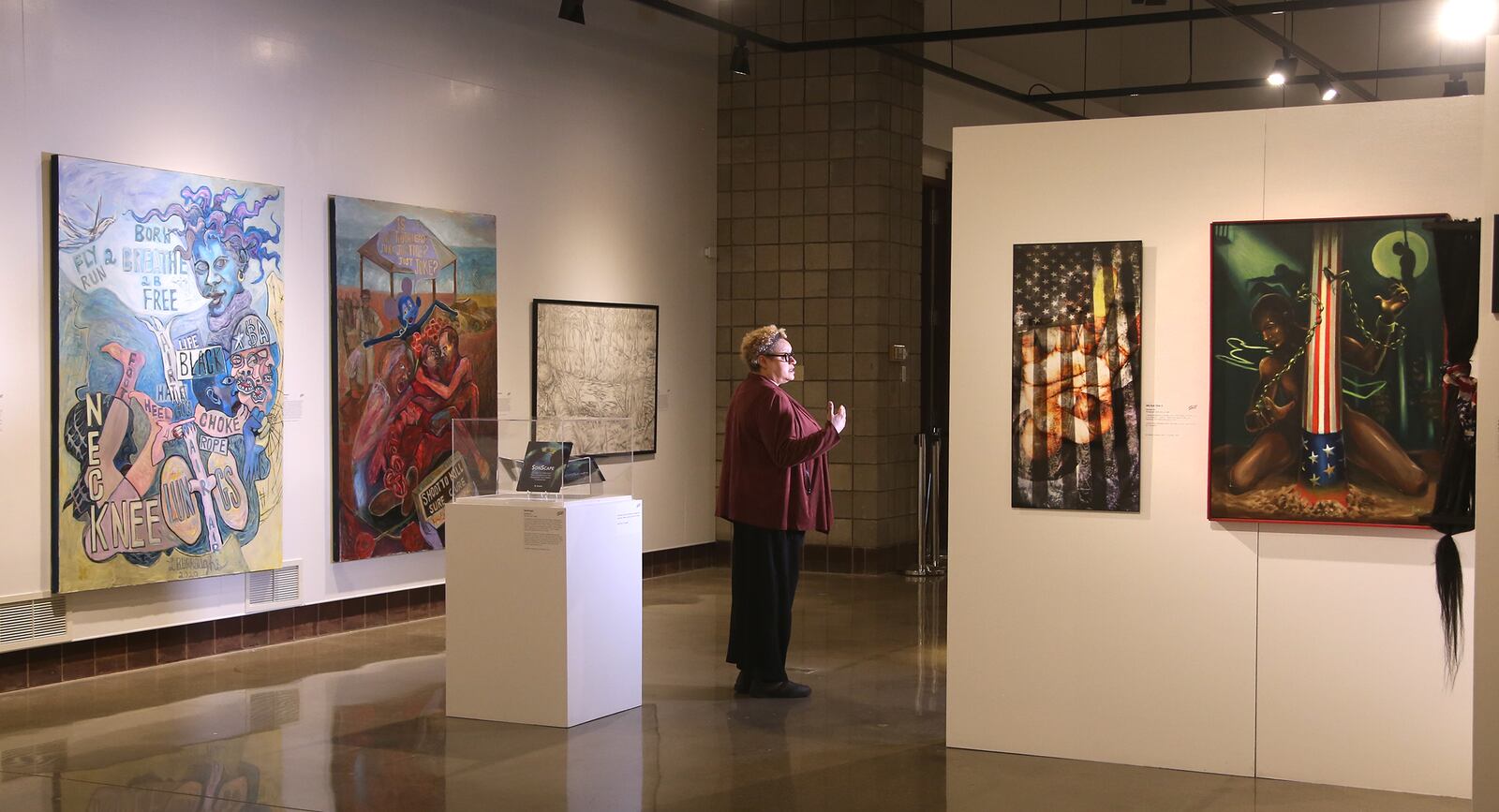 Rosa Rojas, curator at the National Afro-American Museum and Cultural Center, put together the 2020 Art of Soul! exhibition on view through Feb. 27,2021. LISA POWELL / STAFF