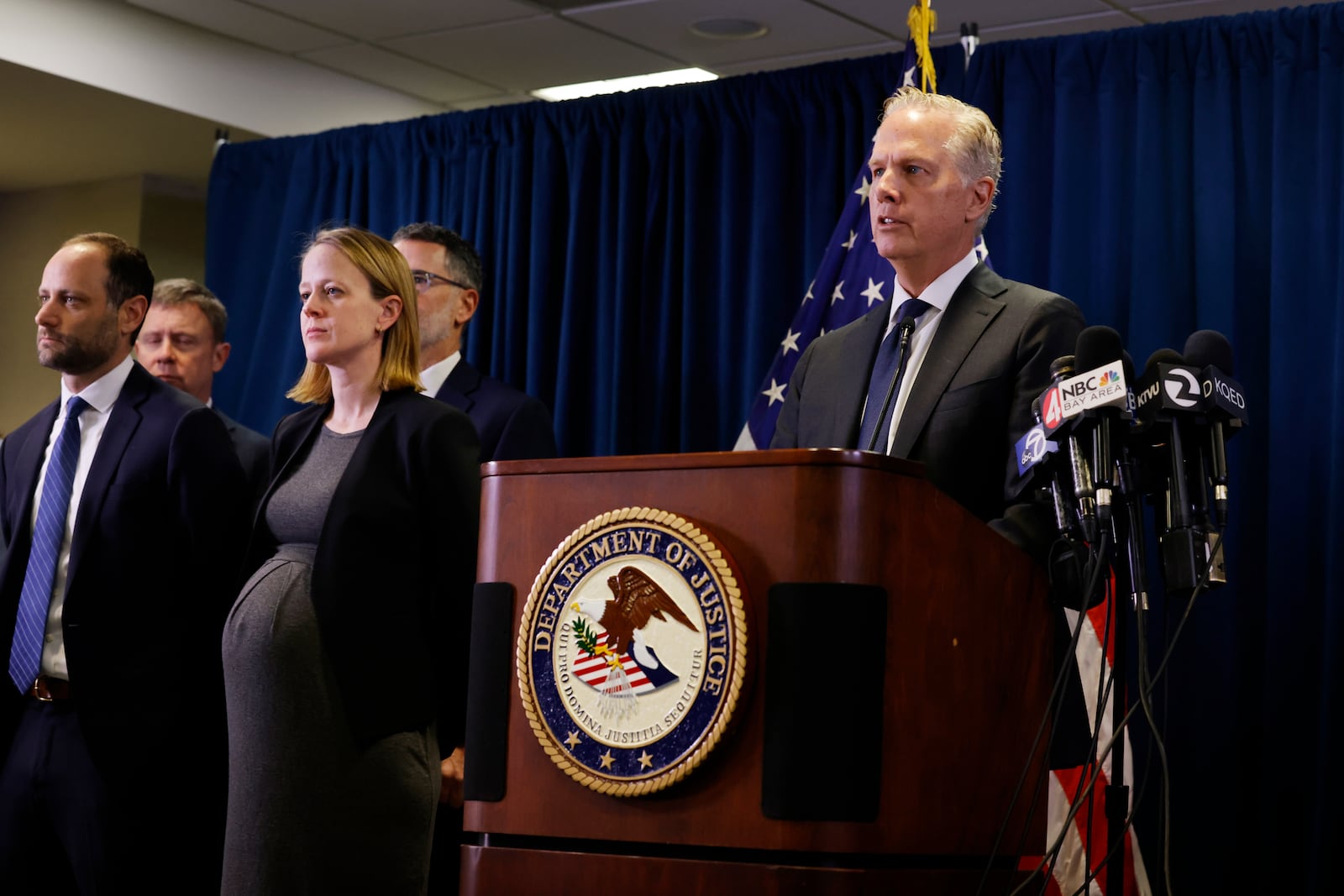 First Assistant United States Attorney Patrick D. Robbins, right, stands with federal officials as he speaks at a news conference announcing the indictment of former Oakland Mayor Sheng Thao on Friday, Jan. 17, 2025 in San Francisco, Calif. (Lea Suzuki/San Francisco Chronicle via AP)