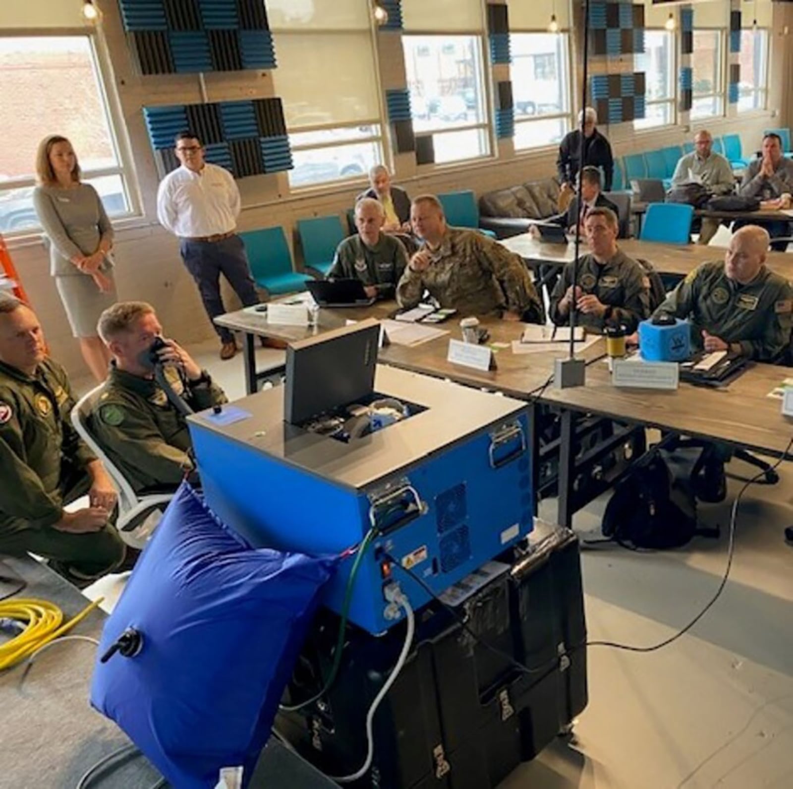 Air Force and Navy officials watch a demonstration during the inaugural Physiological Episodes Mitigation Technology Summit and Industry Day in Dayton Dec. 17-18, 2019. U.S. AIR FORCE PHOTO/LT. COL. CHRISTIANNE OPRESKO