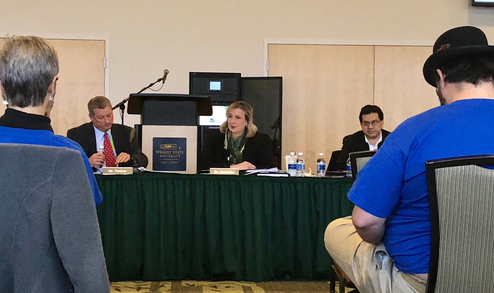 FILE: Wright State University president Cheryl Schrader, center, speaks during a board of trustees meeting at the school’s Lake Campus in Celina on Friday. Although the meeting was held close to 90 minutes north of Dayton, around 80 or so members of the faculty union showed up. They wear blue shirts designating them as AAUP members. The administration and union are negotiating a new contract and earlier this week WSU said it would consider employee furloughs if finances did not improve.