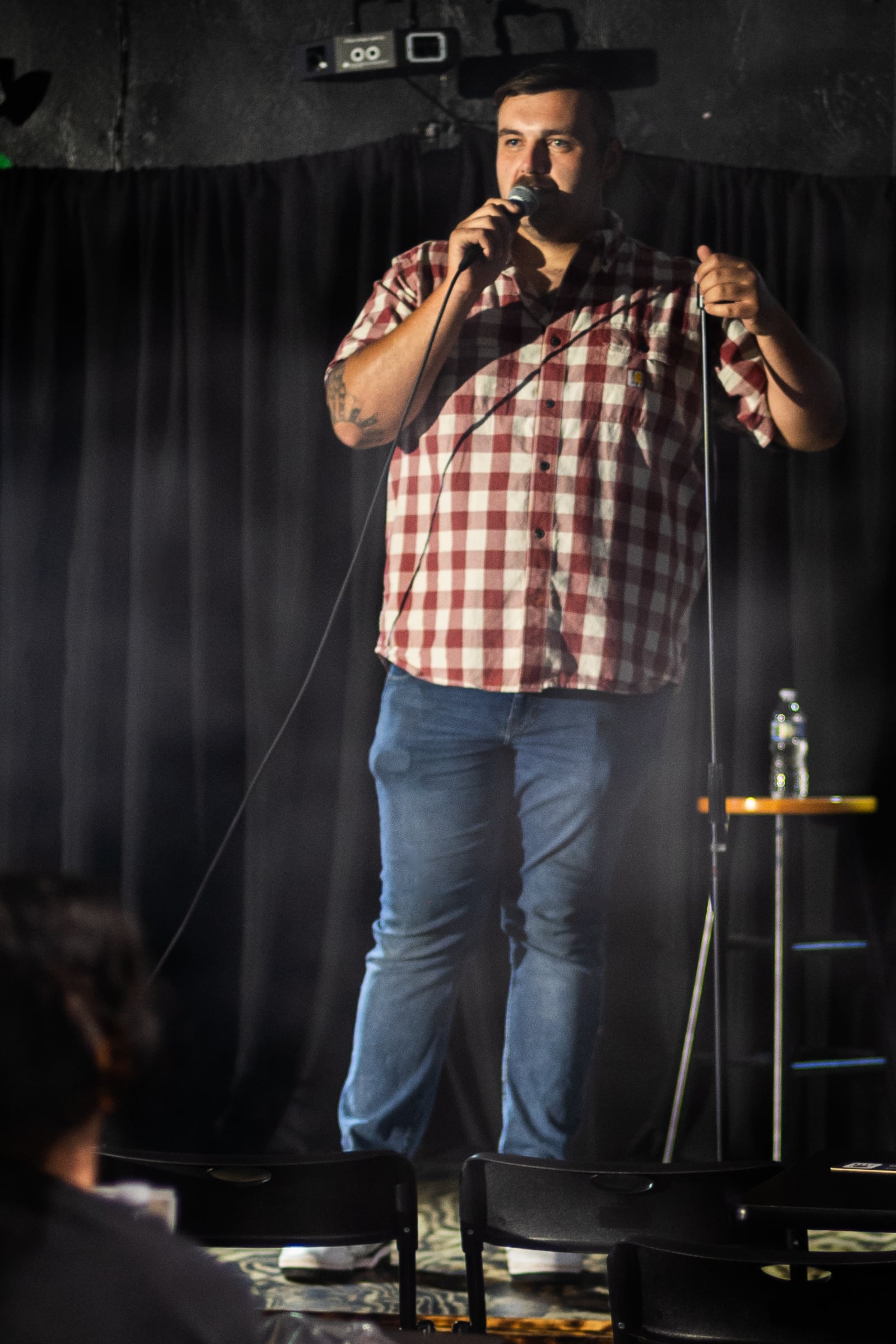 Comedian Johnny Woods performs at the Jokes and Tokes Comedy Club. Photo by Eric Boso