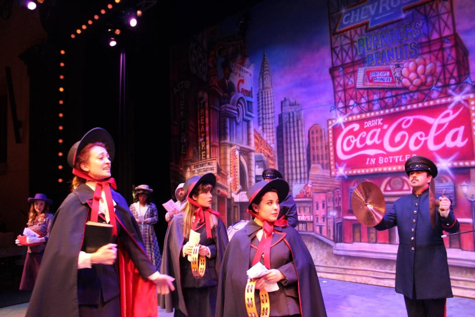 Emily Brennan (Sarah Brown) and the cast of La Comedia Dinner Theatre's production of "Guys and Dolls." PHOTO BY JUSTIN WALTON