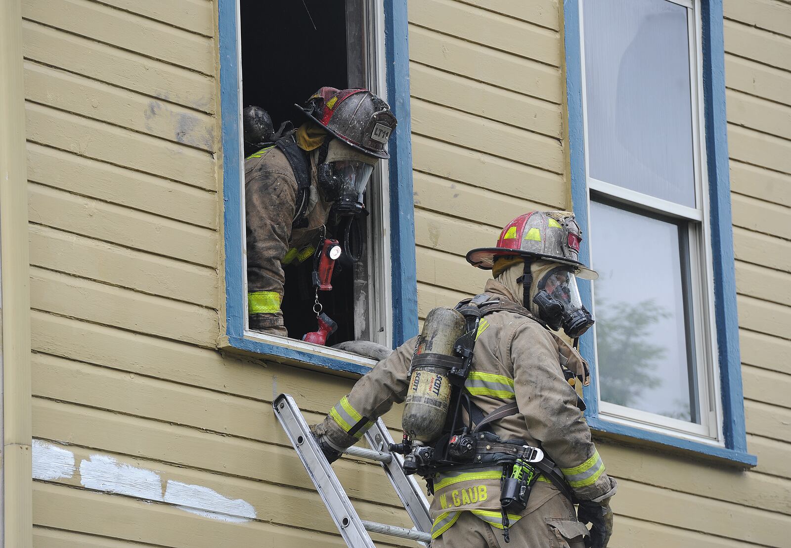 Members of the Dayton Fire Department rescued four cats from a house fire on Mound Street Friday afternoon May 6, 2022. One cat did not survive three others did including two kittens that were given oxygen by paramedics. No one was home at the time of the fire. MARSHALL GORBY\STAFF