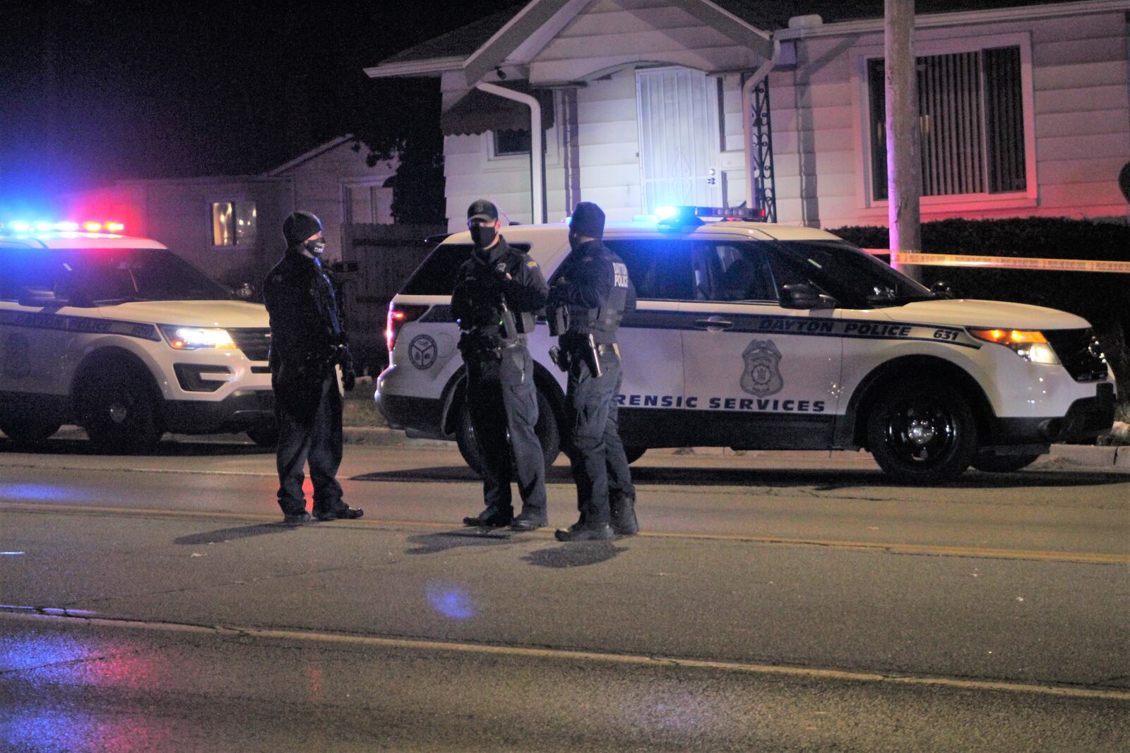 Dayton police at a crime scene. CORNELIUS FROLIK / STAFF