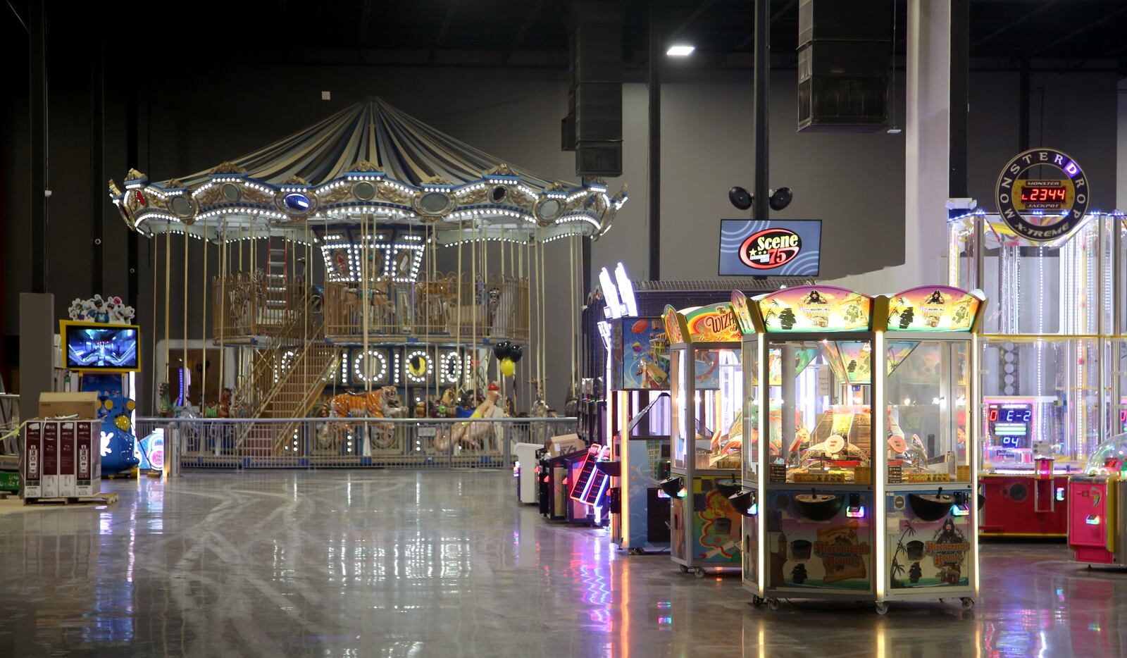 Scene75, closed since May 2019, plans to reopen later this month. The indoor entertainment center on Poe Avenue in Vandalia was heavily damaged by the Memorial Day tornadoes. The newly refurbished center has added a two-story carousel, a spin roller coaster, an indoor 18-hole mini golf course and a banquet center. LISA POWELL / STAFF