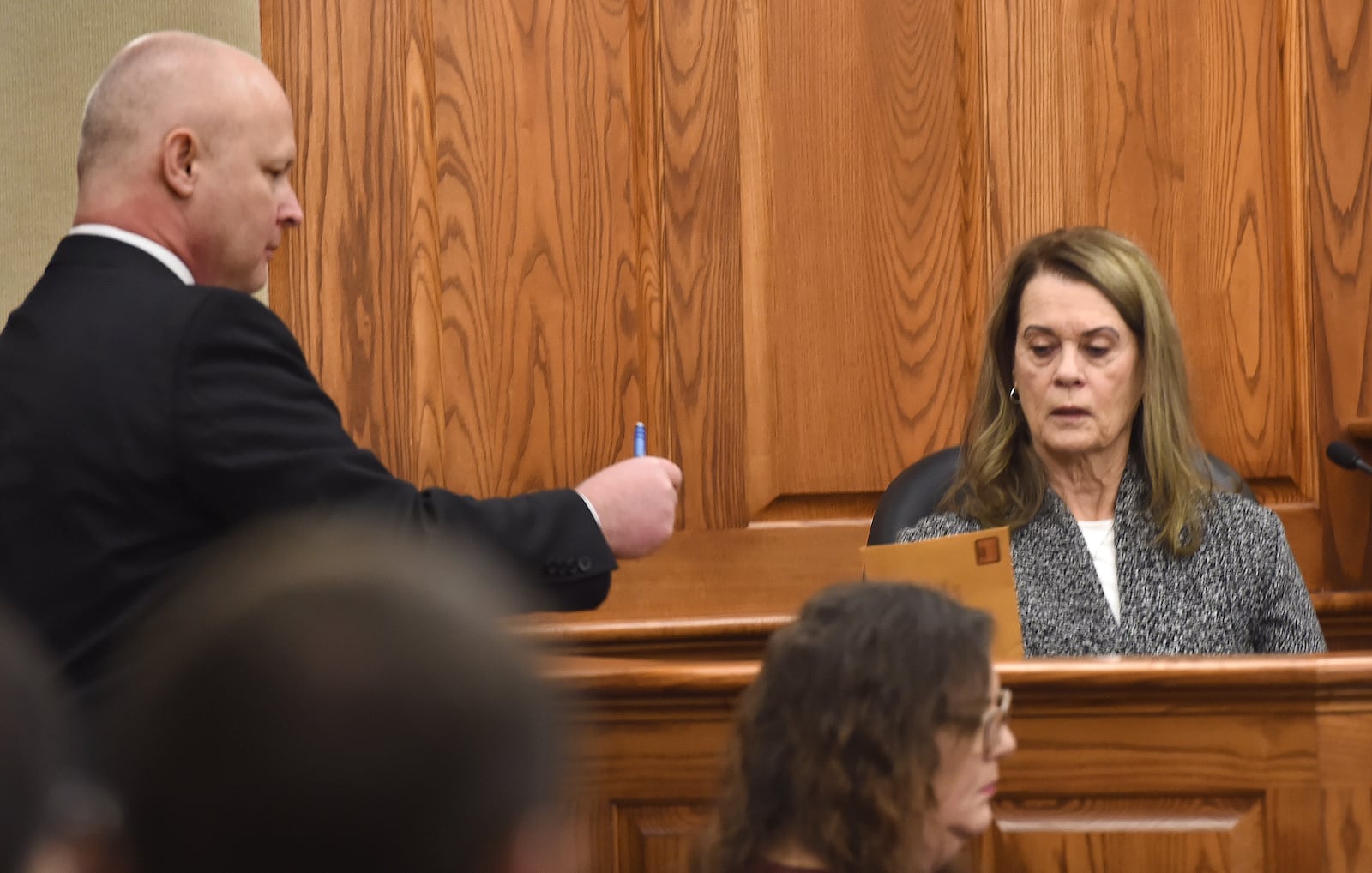 Kanawha County Assistant Prosecutor Chris Krivonyak, left, asks a question of witness Joyce Bailey during the first day of the trial of Donald Lantz and Jeanne Whitefeather in Kanawha County Circuit Court Judge Maryclaire Akers' courtroom Tuesday, Jan. 14, 2025, in Charleston, W.Va. (Chris Dorst/Charleston Gazette-Mail via AP)