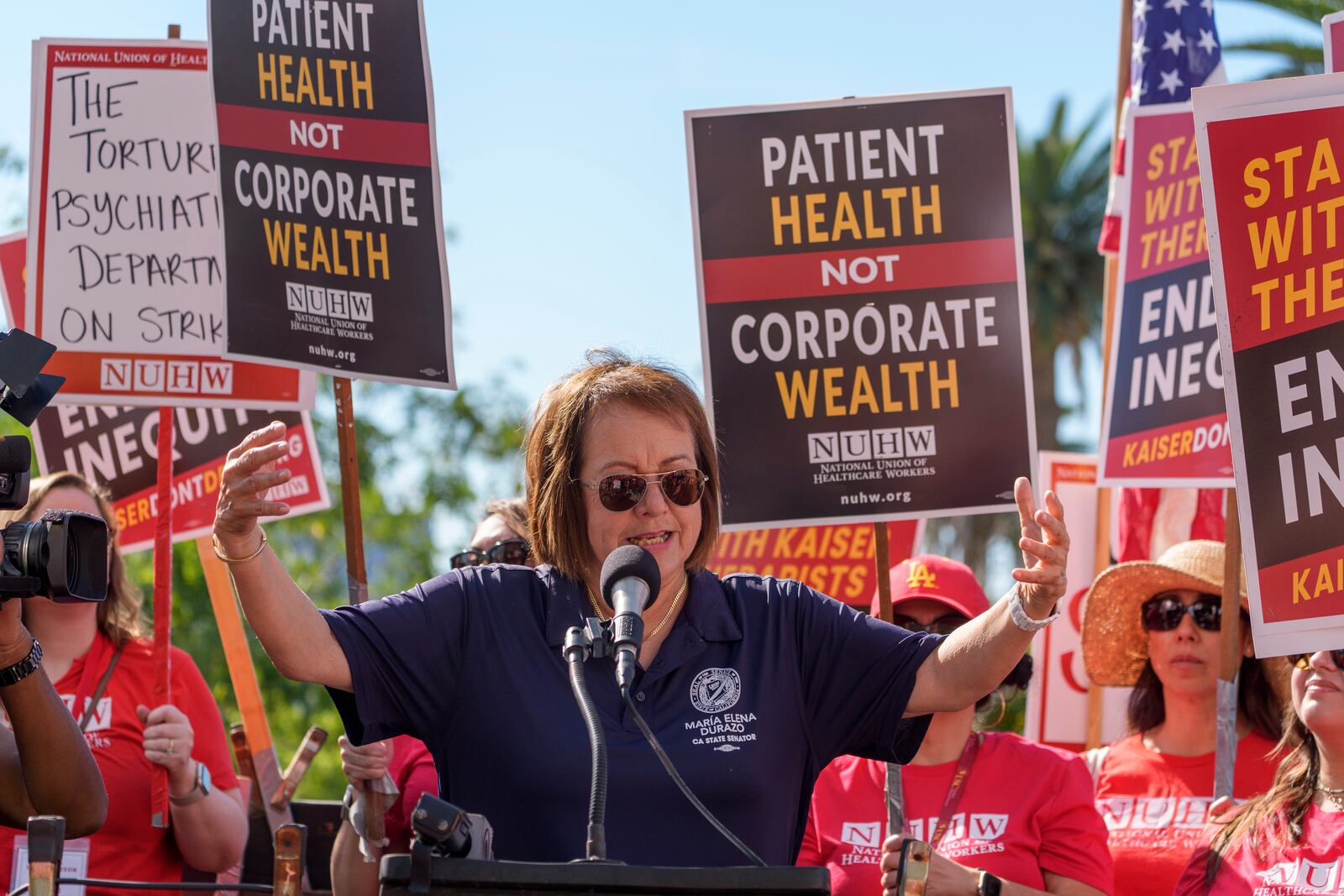 California Democratic state Sen. María Elena Durazo speaks as Kaiser Permanente mental health workers rally outside a Kaiser facility in Los Angeles on Monday, Oct. 21, 2024. (AP Photo/Damian Dovarganes)