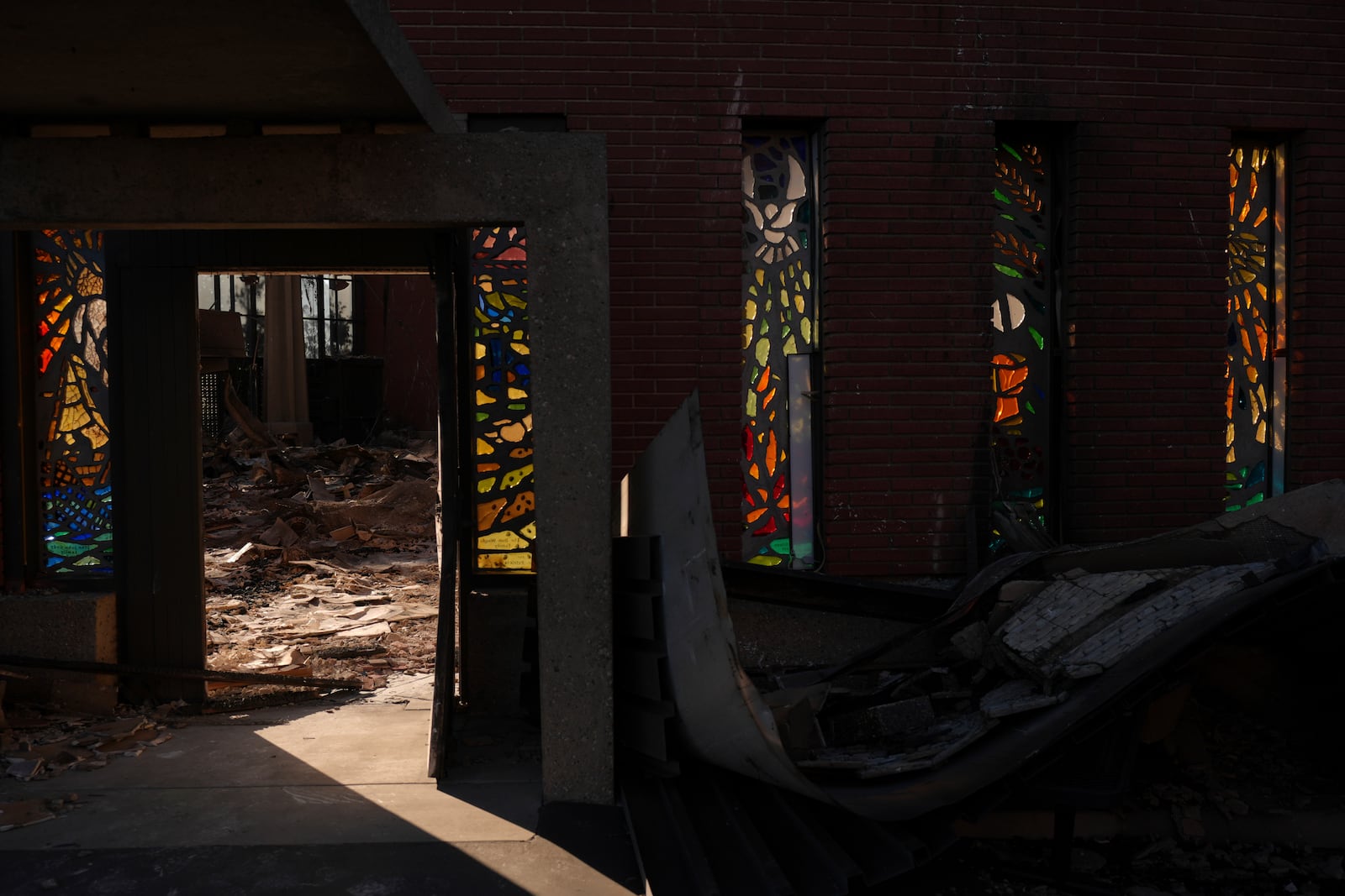 Corpus Christi Church destroyed by the Palisades Fire is seen in Palisades, Calif., Wednesday, Jan. 15, 2025. (AP Photo/Jae C. Hong)