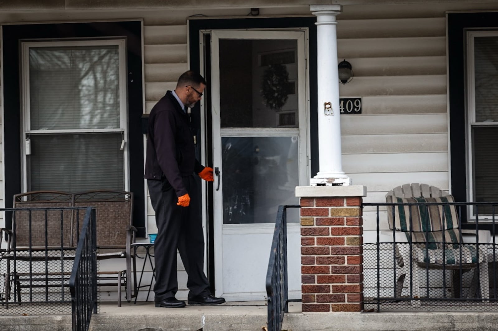 Dayton police taped-off a house on the 1400 block of Holly Ave. in the Belmont neighborhood. Police were seen going in and out of the house. Jim Noelker/Staff