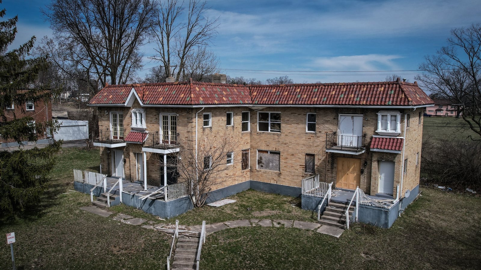 An abandoned multiplex residential property on the 1200 block of Kumler Ave. The building is on the city's nuisance list and it has one of the largest delinquent tax bills of residential properties on the list. JIM NOELKER/STAFF