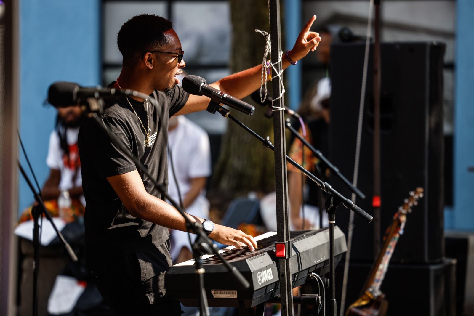 Tobias Hill of "American Idol" sings on Fifth Street in the Oregon District Friday, Aug. 4, 2023, during a remembrance event on the four-year anniversary of the mass shooting. JIM NOELKER/STAFF