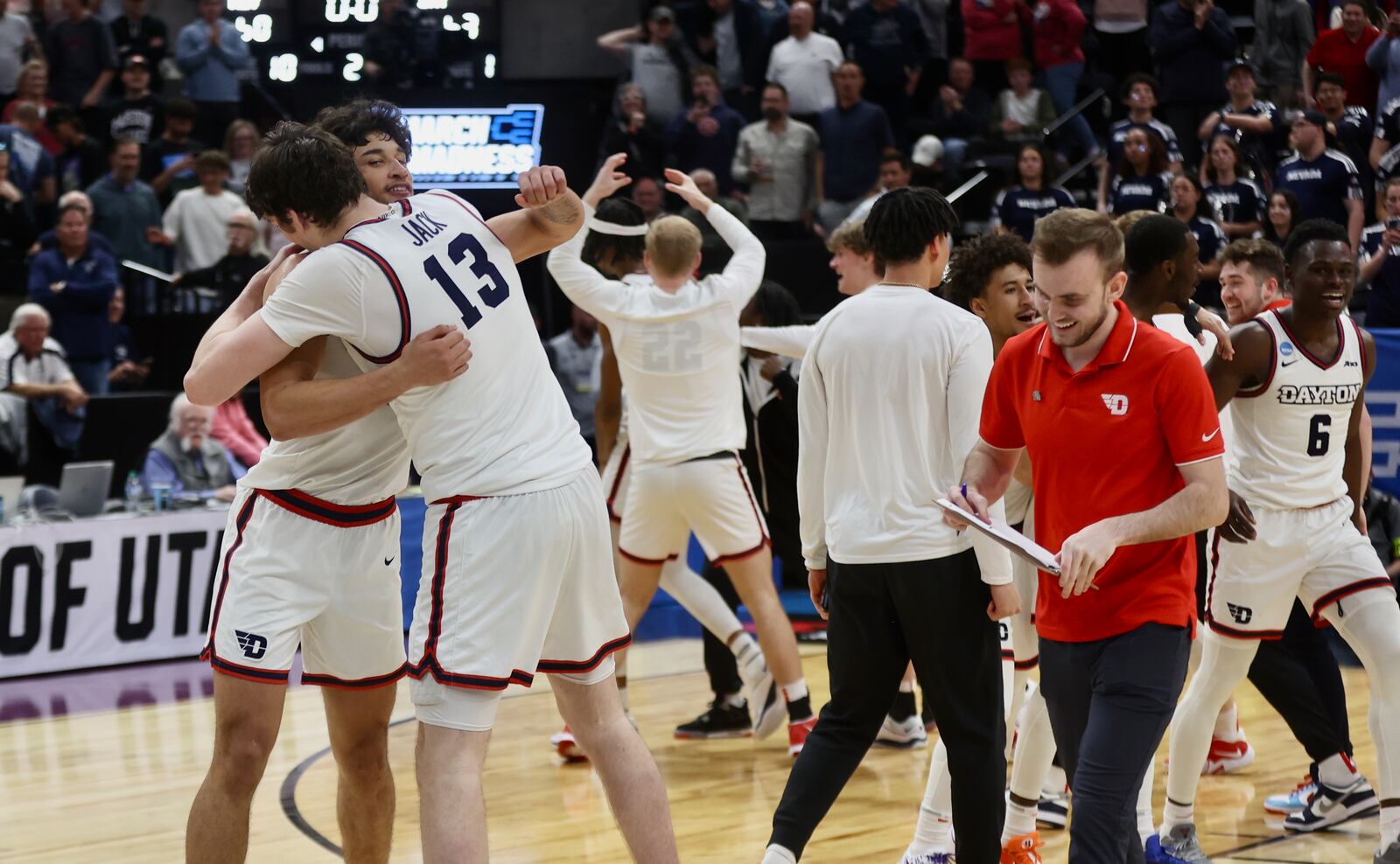 Dayton celebrates a victory against Nevada in the first round of the NCAA tournament on Thursday, March 21, 2024, at the Delta Center in Salt Lake City, Utah. David Jablonski/Staff