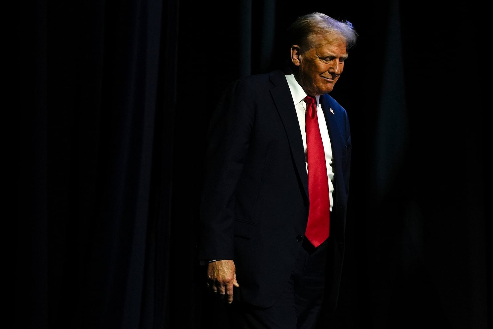 Republican presidential nominee former President Donald Trump arrives to speak at a meeting of the Detroit Economic Club, Thursday, Oct. 10, 2024, in Detroit. (AP Photo/Julia Demaree Nikhinson)