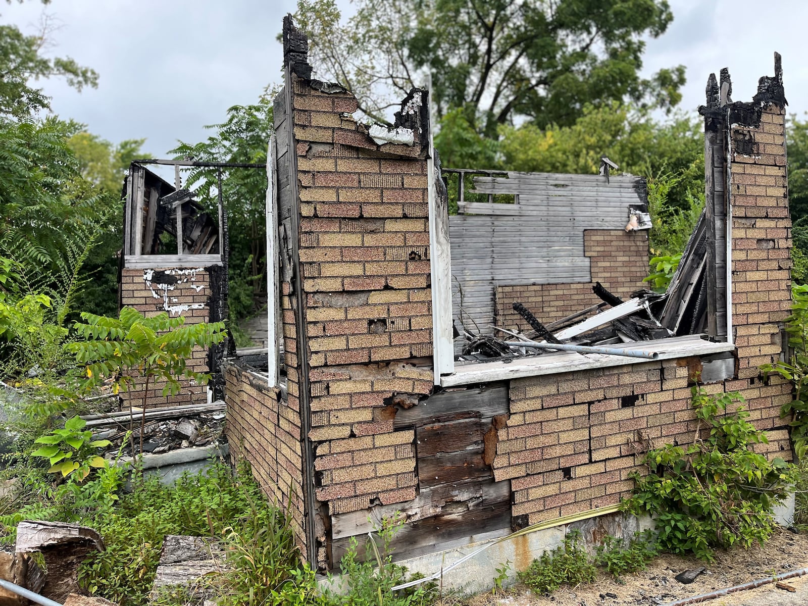 A home on the 800 block of Conners Street in West Dayton that was destroyed by fire a couple of years ago. The home was vandalized and burned down after the owner, Victor Santana, killed two teenagers who were trespassing in his detached garage. Santana was later found guilty of murder. CORNELIUS FROLIK / STAFF