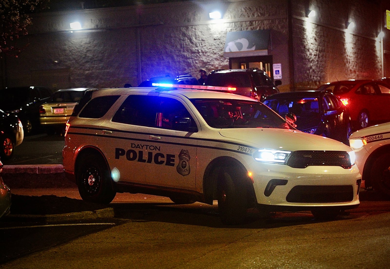 University of Dayton and Dayton Police keep a close eye on crowds of students Saturday night, March 16, 2024. MARSHALL GORBY \STAFF