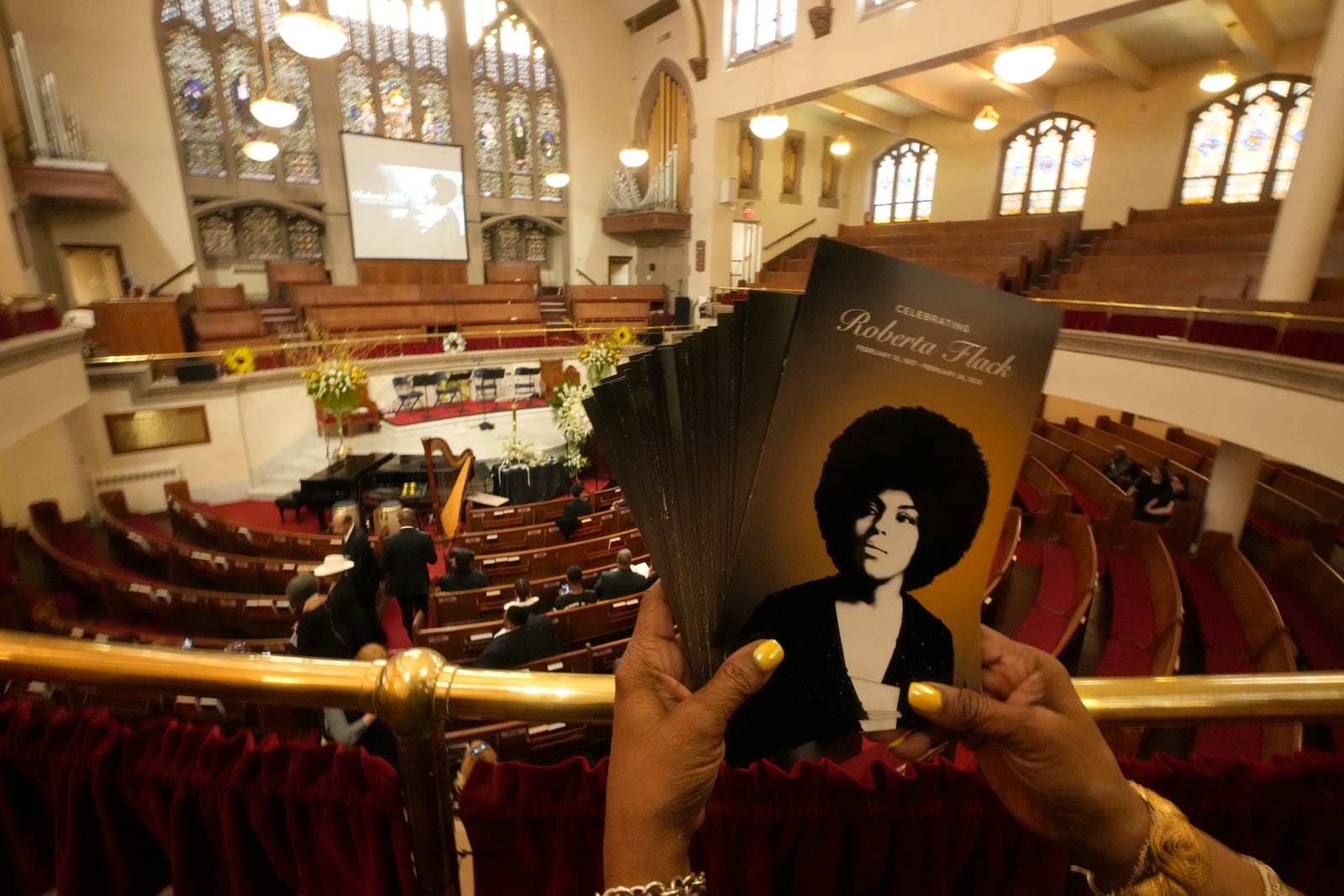 Programs are pictured prior to a ceremony in celebration of Roberta Flack's life at The Abyssinian Baptist Church on Monday, March 10, 2025, in New York. (AP Photo/Richard Drew)