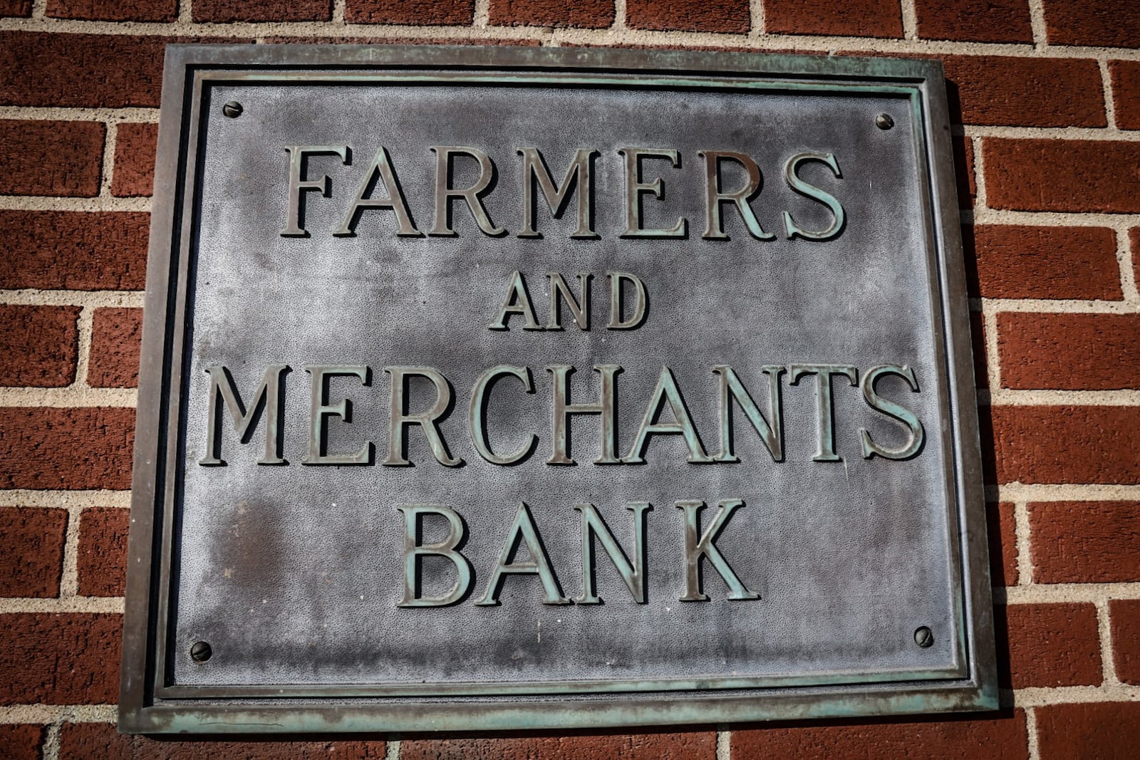 Farmers & Merchants Bank in downtown Miamisburg turns 100-years-old at the end of December. JIM NOELKER/STAFF