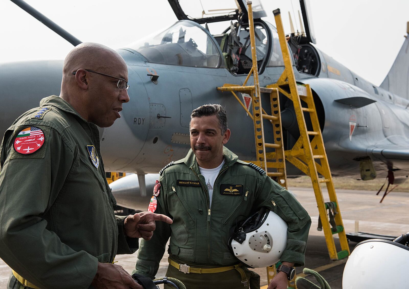 Gen. Charles "CQ" Brown Jr., then the Pacific Air Forces commander, discusses an orientation flight in an Indian Air Force Mirage 2000 at Cope India 19 at Kalaikunda Air Force Station in this file photo. Today, Gen. Brown is the chief of staff for the Air Force. Air Force photo/Staff Sgt. Hailey Haux)