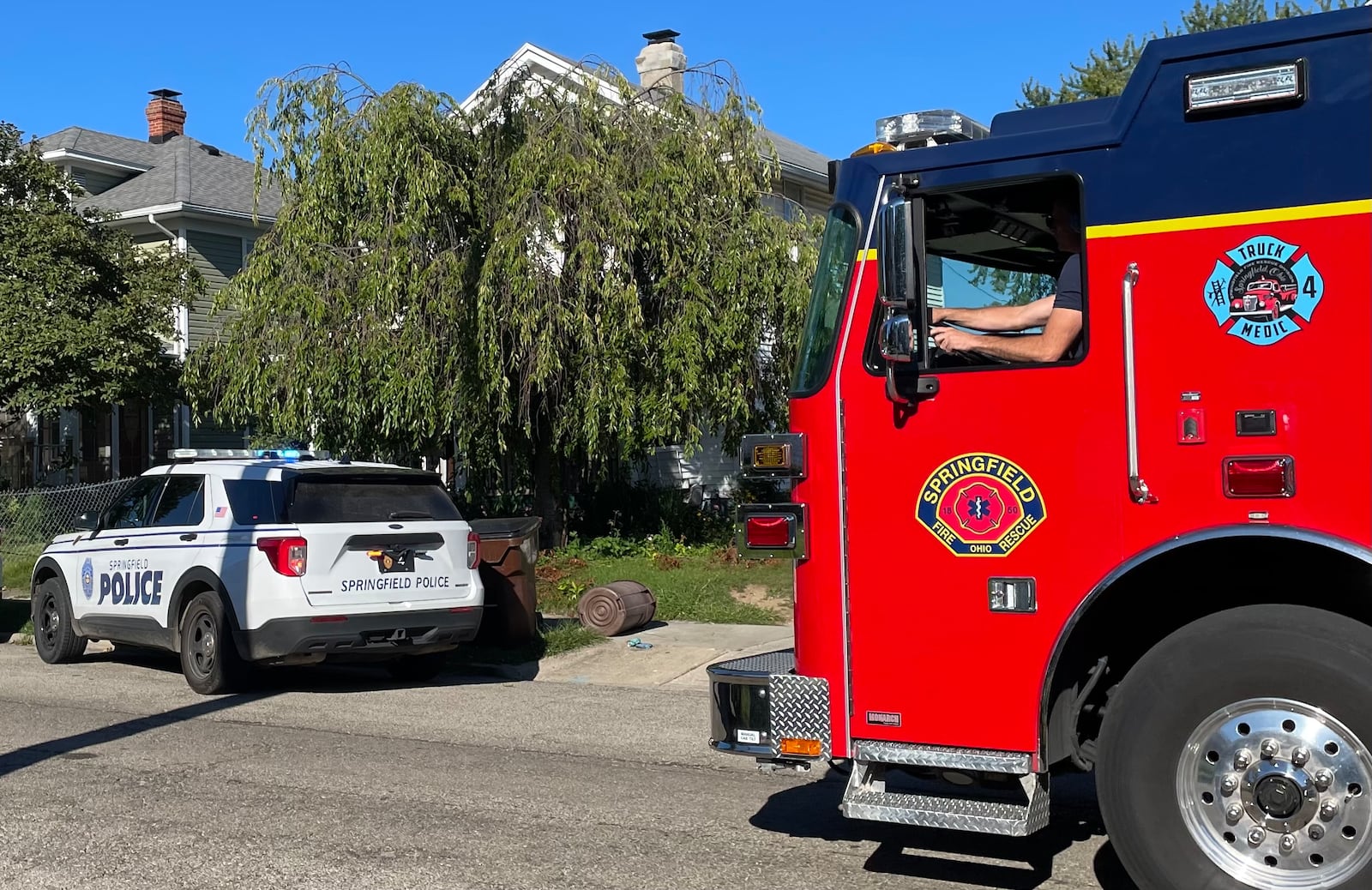 Springfield police and fire personnel were on the scene at a house in the 200 block of North Clairmont Avenue where a 1-year-old boy was found in a backyard pool Thursday, Aug. 31, 2023. BILL LACKEY/STAFF