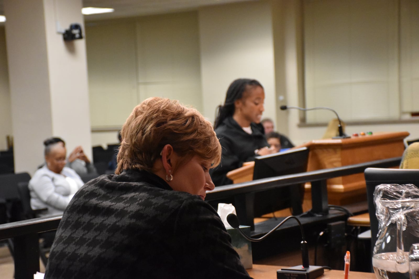 Dayton City Manager Shelley Dickstein takes notes as Destiny Brown speaks at a city commission meeting on Jan. 31, 2024. Brown, a community organizer with Advocates for Basic Legal Equality, criticized the Dickstein because she said the city manager was not willing to appoint a member of the Dayton Tenant Union to a new housing policy steering committee. CORNELIUS FROLIK / STAFF