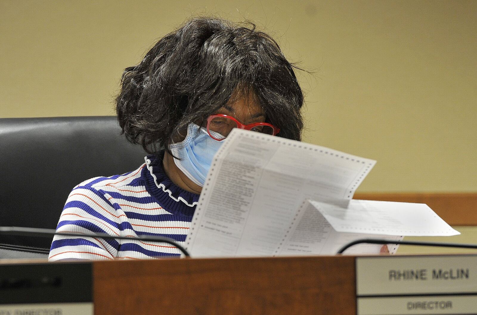 Rhine McLin, chairperson of the Montgomery County Board of Elections BoRhine McLin, looks over ballots Monday to certify the results of the primary election. MARSHALL GORBYSTAFF