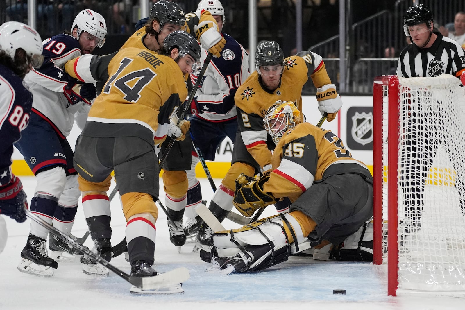 Columbus Blue Jackets center Adam Fantilli (19) scores against Vegas Golden Knights goaltender Ilya Samsonov (35) during the first period of an NHL hockey game Thursday, Jan. 30, 2025, in Las Vegas. (AP Photo/John Locher)