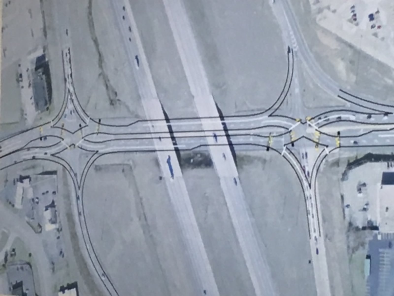 This illustration shows how a diverging diamond interchange design would change traffic flow at the Ohio 725 exit on Interstate 75.