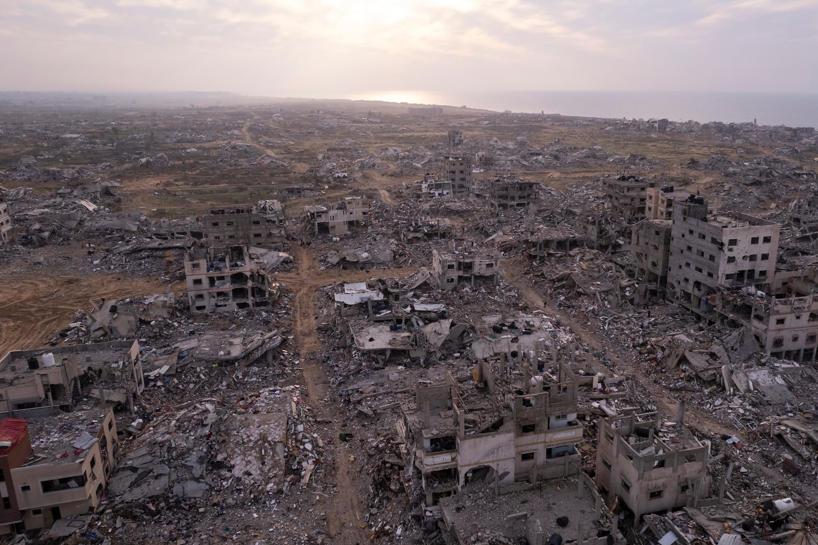 Buildings that were destroyed by the Israeli air and ground offensive are seen at the Tel al-Hawa neighbourhood in Gaza Strip, Tuesday, Jan. 28, 2025. (AP Photo/Mohamamd Abu Samra)