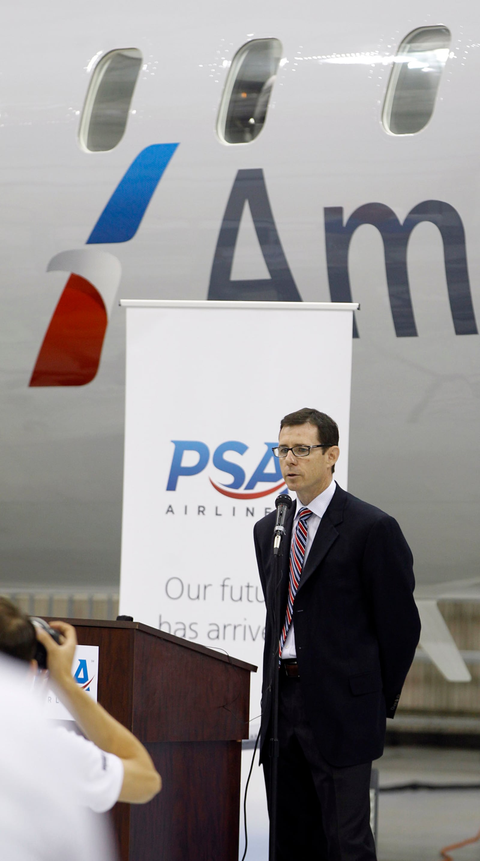 Dayton based PSA Airlines took delivery of its first Bombardier CRJ900 on Wednesday, May 21 at the Dayton International Airport. PSA CEO Dion Flannery spoke about the new regional jet that features 76 seats, 12 of which are business class. TY GREENLEES / STAFF