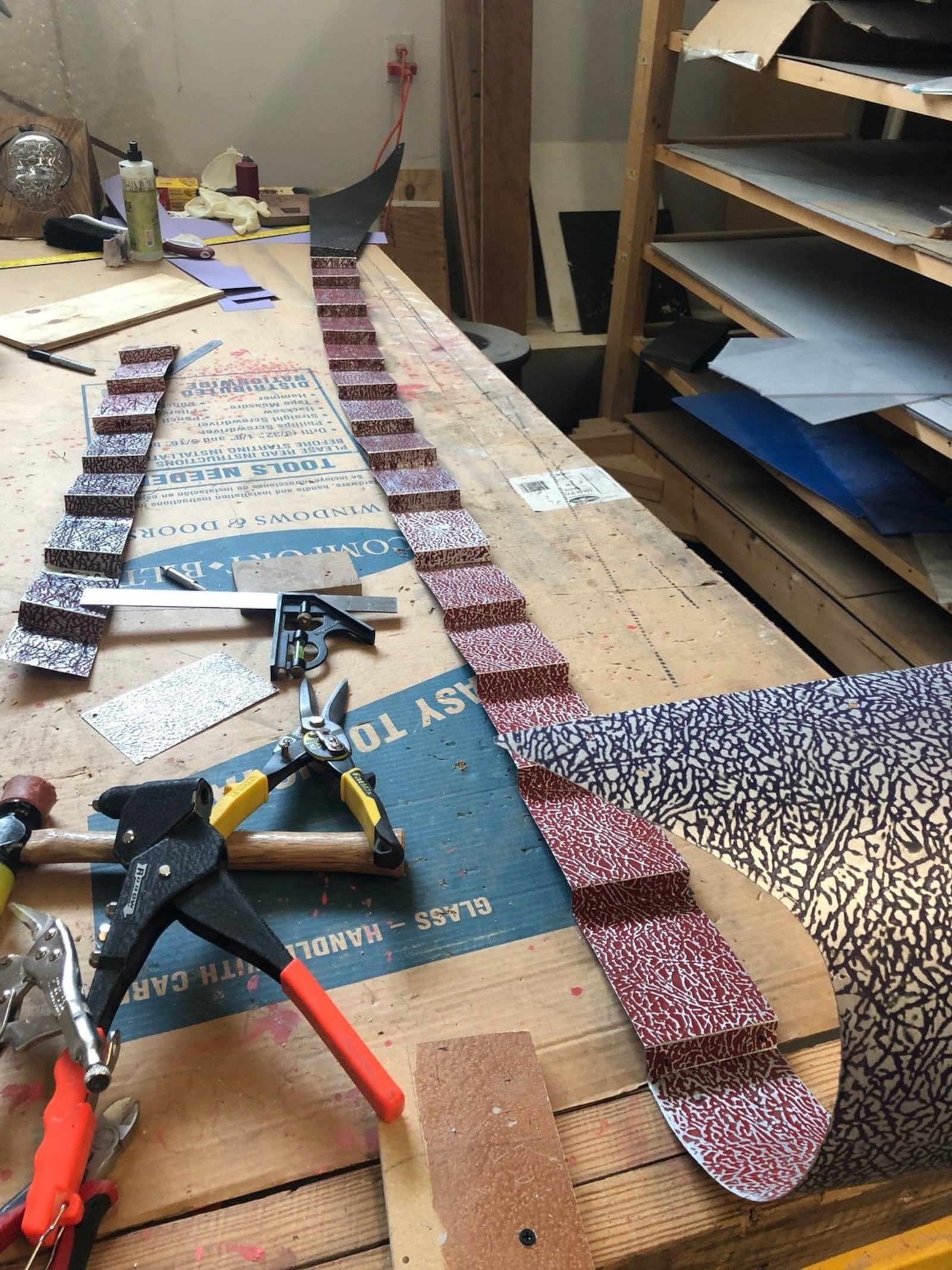 Sculptor Richard Lapedes created his work tables from sections of bowling lanes he bought at Mendelson’s. CONTRIBUTED