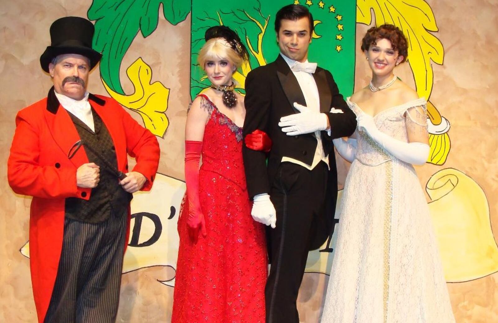 (left to right) Chris Beiser (in multiple D'Ysquith roles), KatieAnn Bonavita (Sibella Hallward), David Thomas (Monty Navarro) and Hannah Hensler (Phoebe D'Ysquith) appear in La Comedia Dinner Theatre's production of "A Gentleman's Guide to Love and Murder." CONTRIBUTED