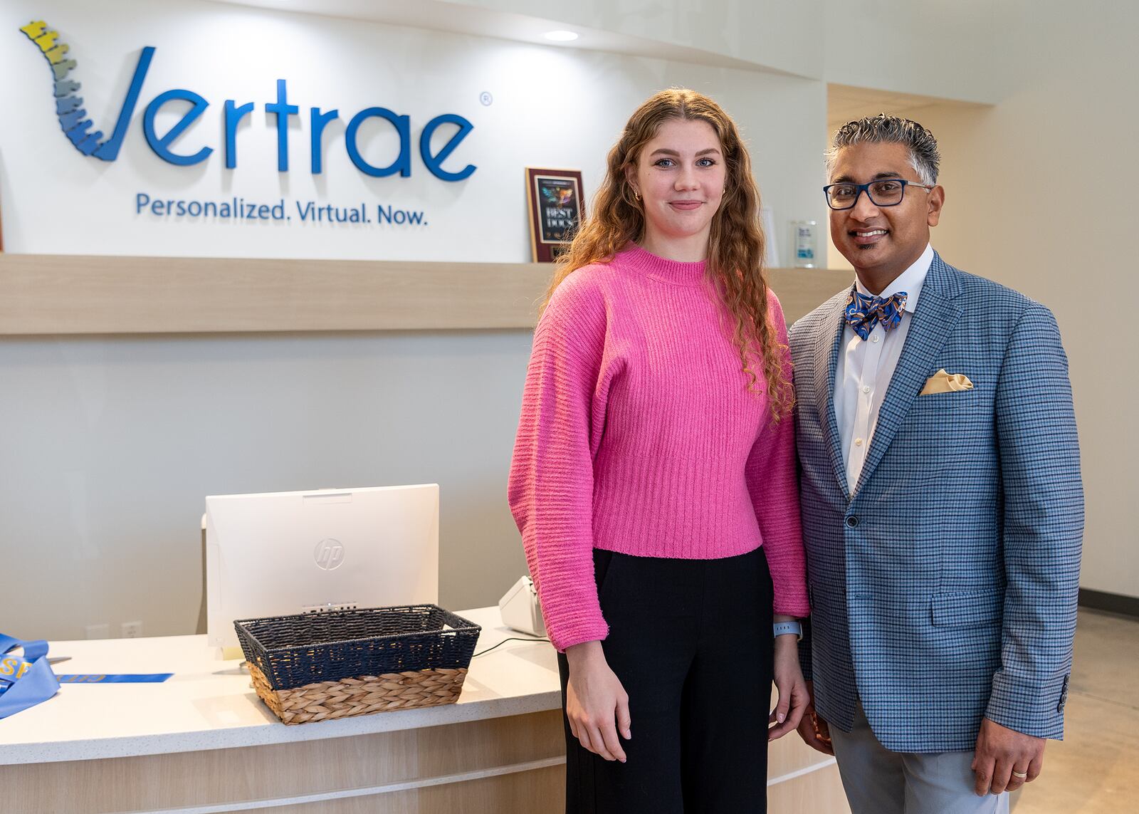 Hensley (Left) with Kamal Woods, MD at the Vertrae Ribbon Cutting_Open House on February 29, the day after her spine surgery.