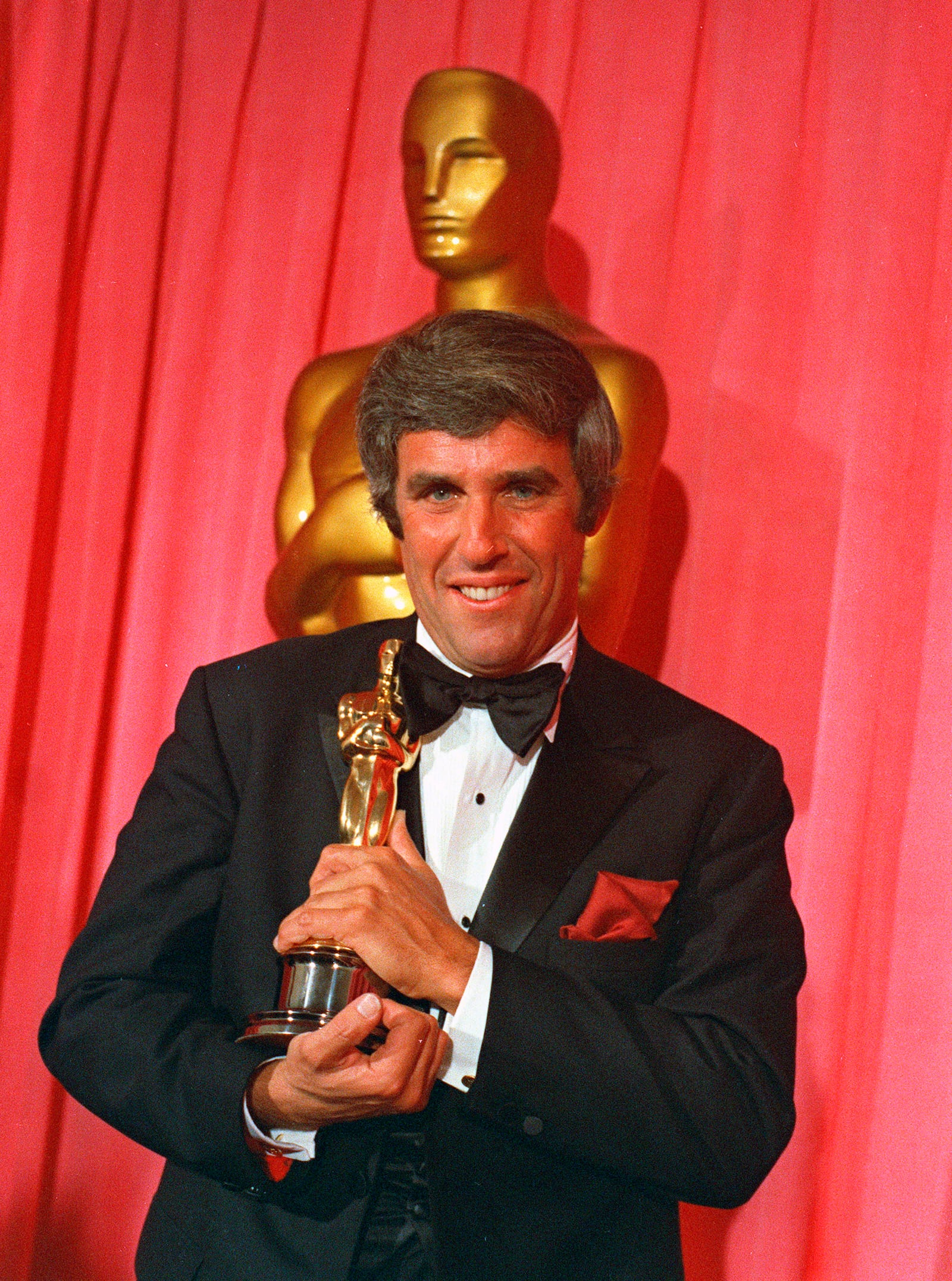 FILE - Burt Bacharach poses with his Oscar for best original score for "Butch Cassidy and the Sundance Kid" at the 42nd annual Academy Awards in Los Angeles on April 7, 1970. (AP Photo, File)