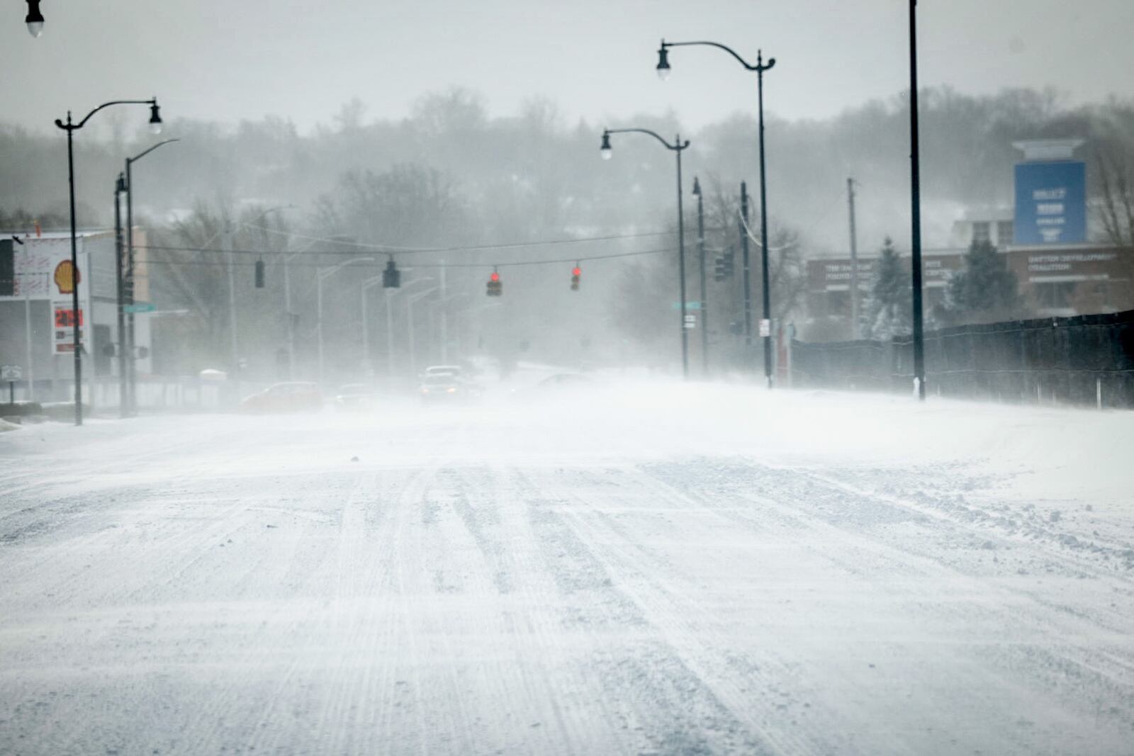 The winter storm has created near white-out conditions on Main Street in Dayton. Jim Noelker/Staff