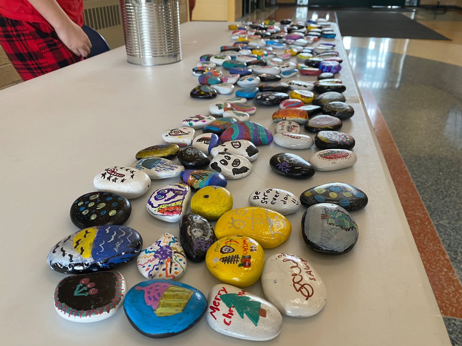 Once a month, a group of classes set up tables to raise money through what's called Charities For Change by selling various items, like homemade stickers or hand-painted rocks, and donating proceeds to either a local, national or international charity. Also, every week, students at Ridgeway Elementary are honored on World Changers Wednesdays for making a change in their corner of the world. They're honored with their picture on a wall with a description of what they did to make a change. PHOTO PROVIDED BY TVHAMILTON