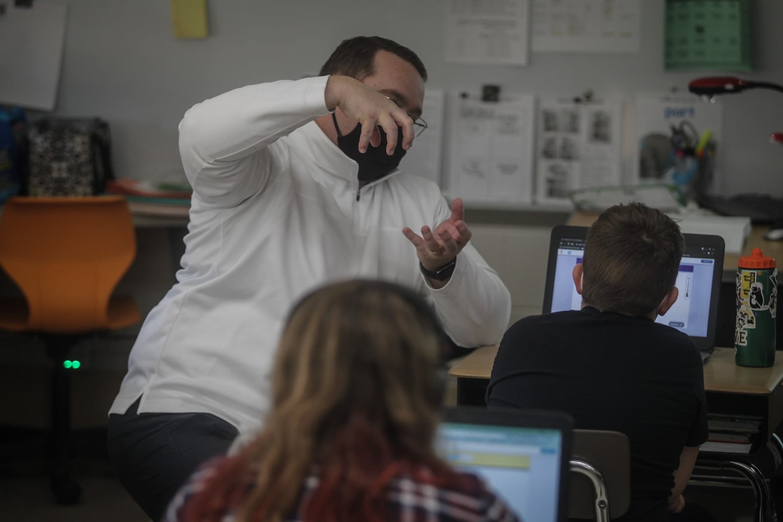 Orchard Park Elementary School math teacher, Andy Ayres talks about fractions Tuesday March 2, 2021. The school is now open for in person learning after 12 months of COVID-19 restrictions.