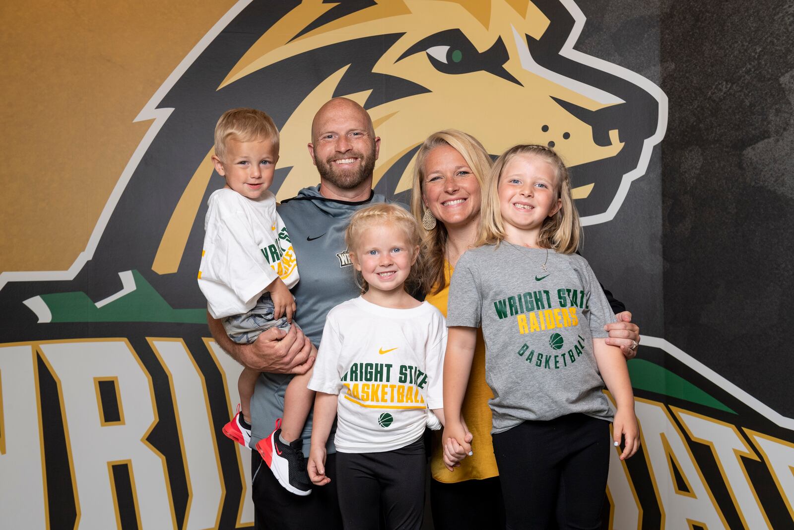 Wright State women's basketball coach Kari Hoffman and her family when she was introduced as the Raiders coach in 2021. Husband Jimmy and their children (from left) Tripp, Breslyn and Finley. Wright State Athletics photo