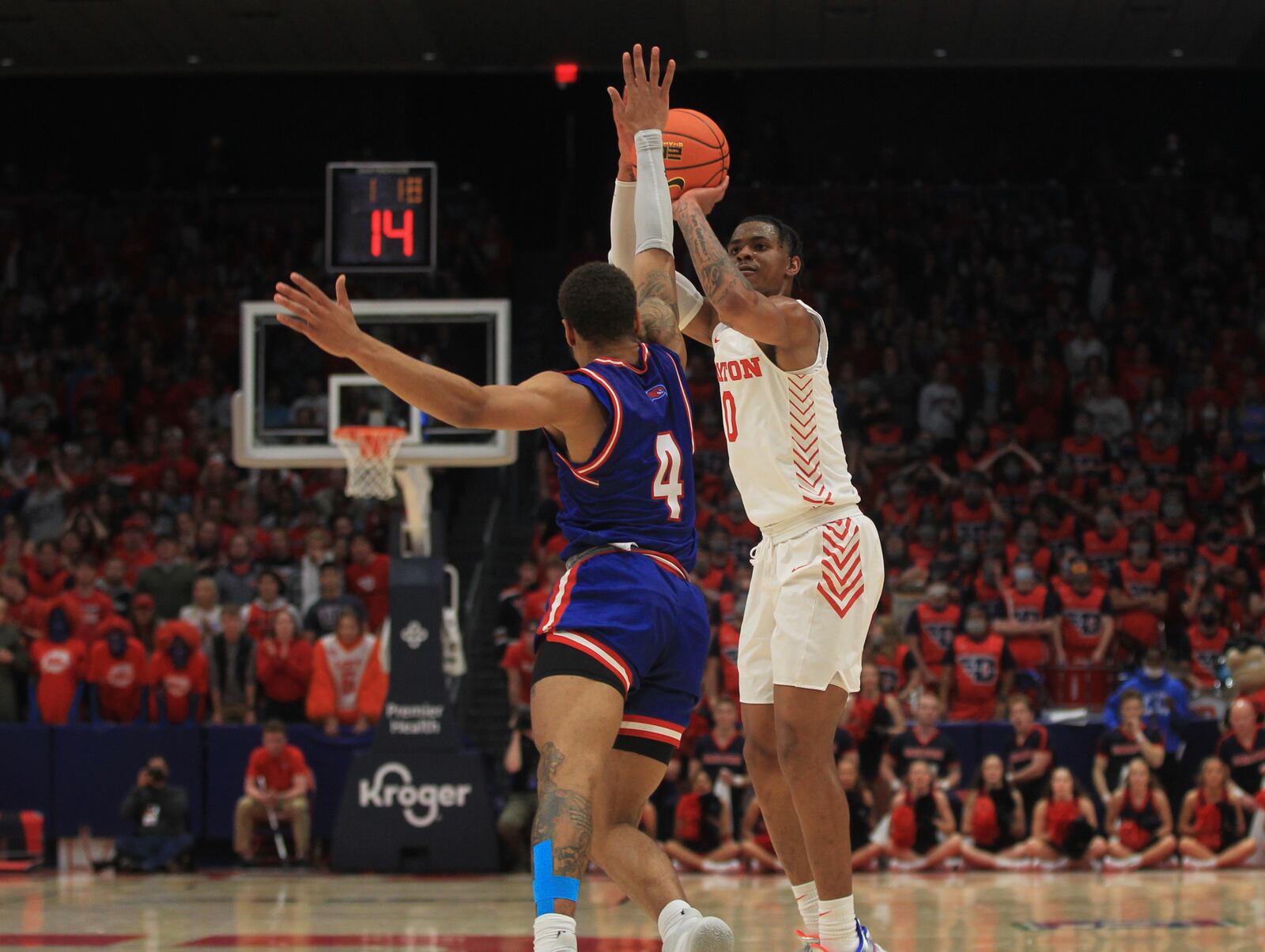 Dayton's Elijah Weaver makes a go-ahead 3-pointer in the final minutes against UMass Lowell on Saturday, Nov. 13, 2021, at UD Arena. David Jablonski/Staff