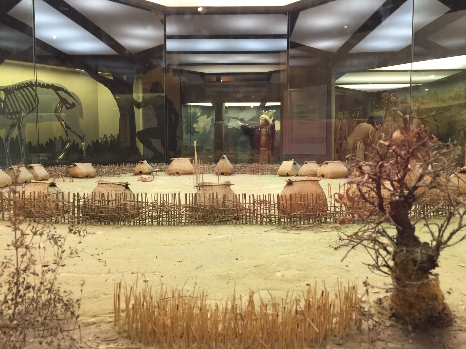 The Interpretive Center at SunWatch Indian Village/Archaeological Park includes a model of the 800-year-old village of the Fort Ancient people. CONNIE POST / STAFF