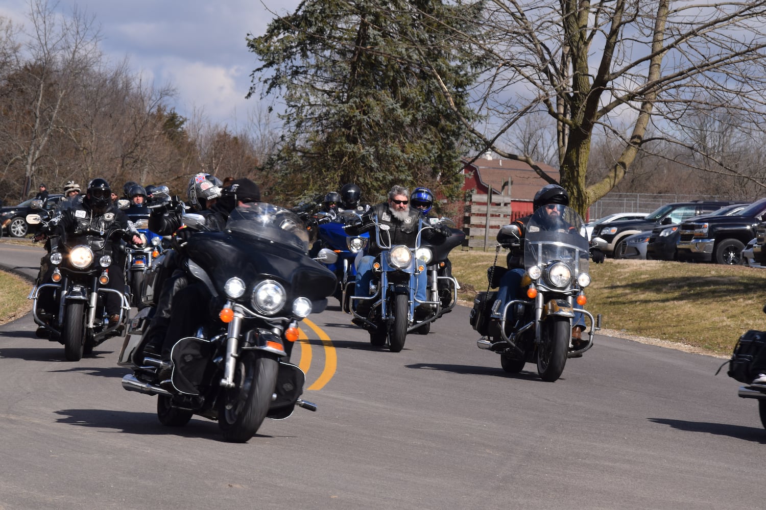 PHOTOS: Thousands of Outlaws attend motorcycle gang leaders funeral at Montgomery County Fairgrounds.