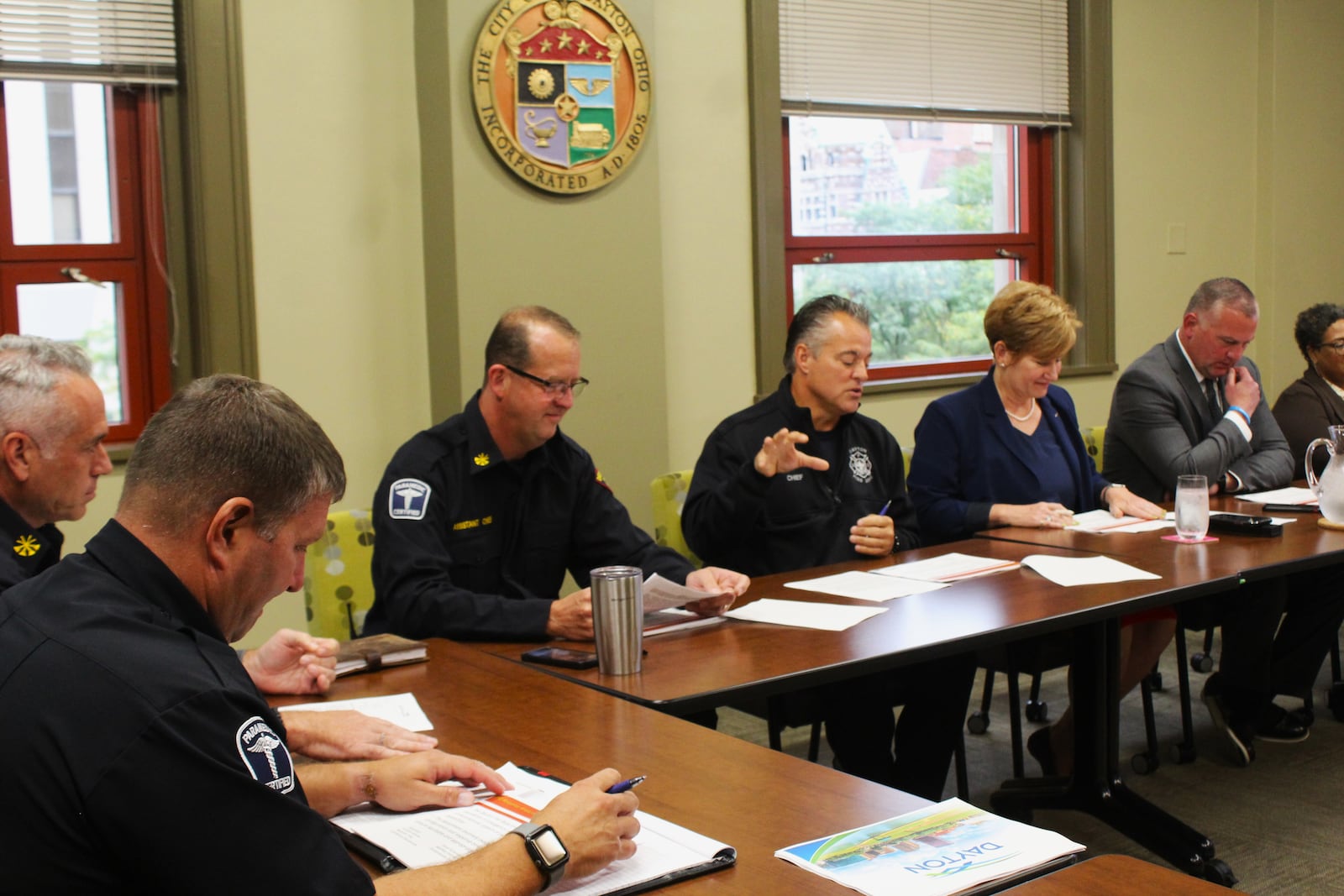 Dayton Fire Chief Jeff Lykins and Assistant Chief Nicholas Hosford talk to city commission members about fire and EMS response times and incidents during a presentation on Sept. 27, 2023. CORNELIUS FROLIK / STAFF