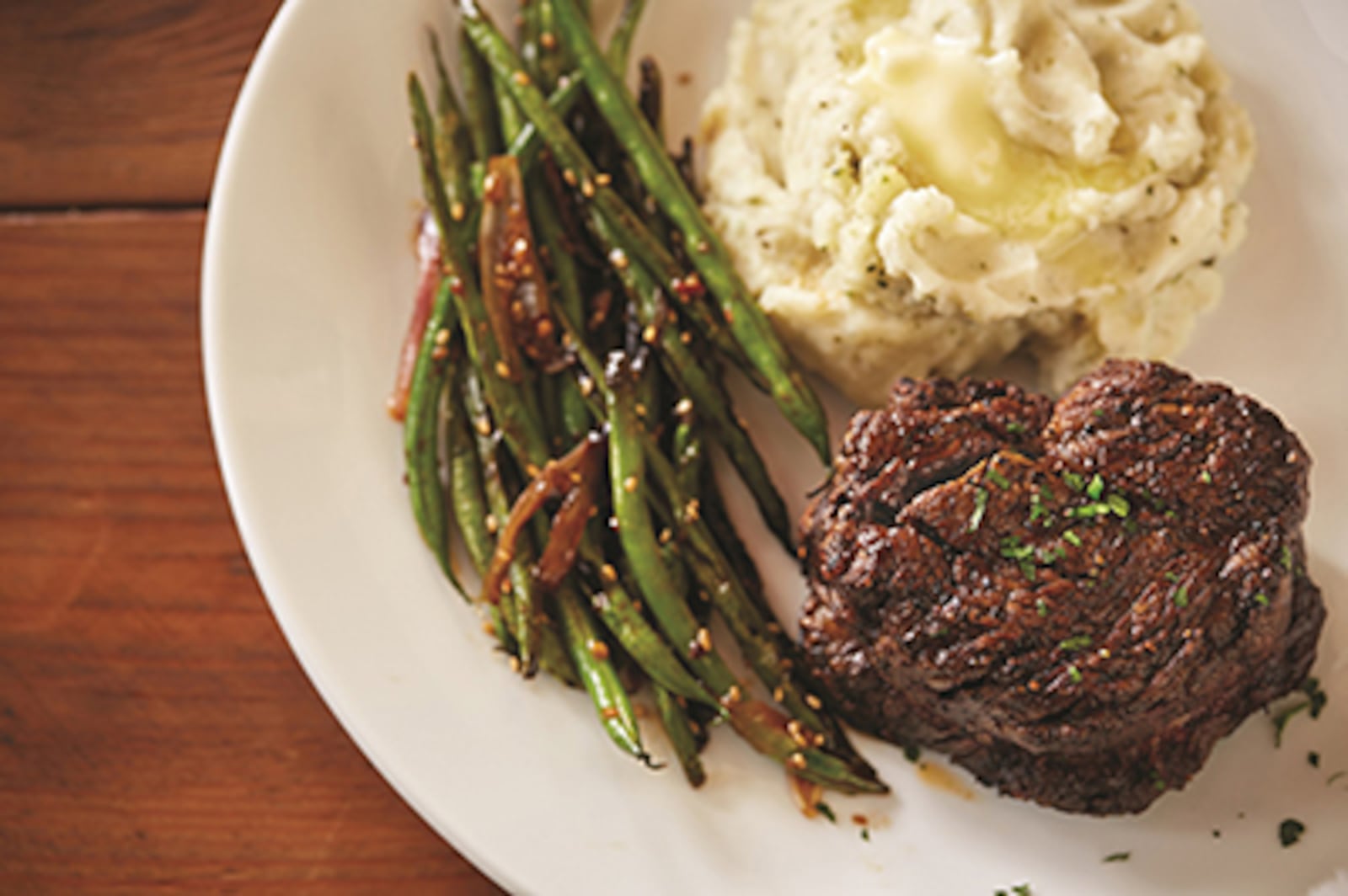 Grilled steak with grilled potatoes and vegetables (Image provided by Fleming's Prime Steakhouse & Wine Bar)