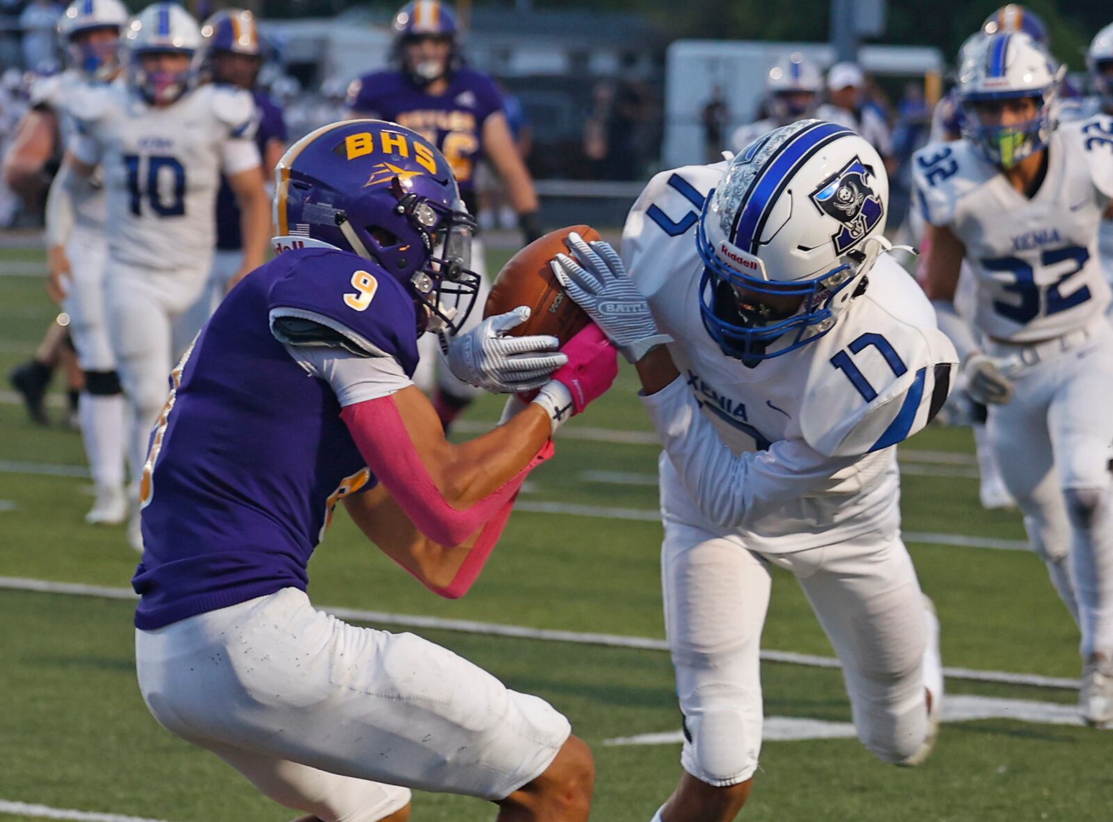 Xenia's Cristian Corbett intercets a Butler pass meant for Braylen Crump inside the five yard line during Friday's game. BILL LACKEY/STAFF