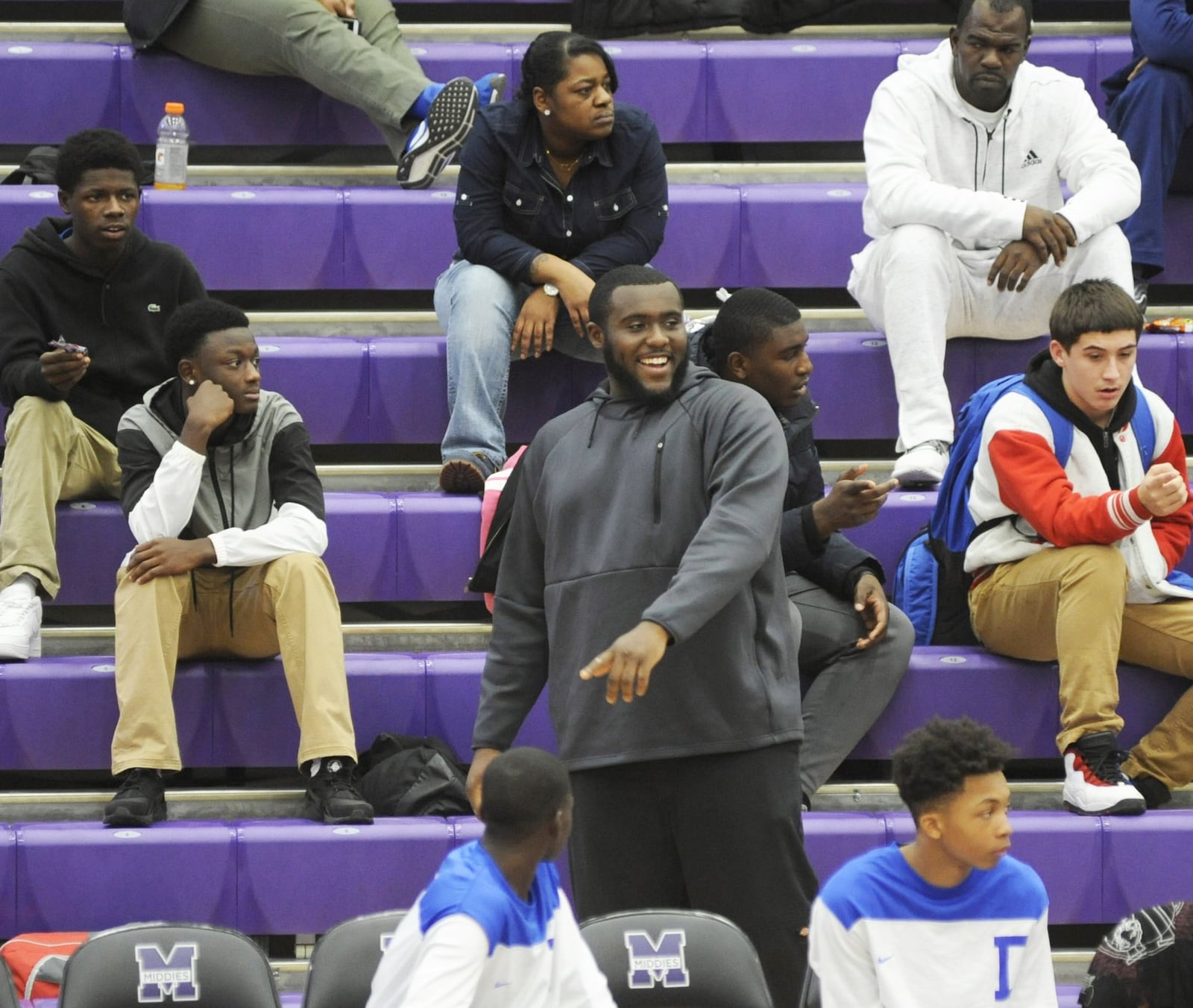 Dunbar senior Jonathan Allen (center), the Dayton City League MVP last season, is out following knee surgery. He was a fixture behind the bench during Middletown’s 60-28 defeat of visiting Dunbar on Tuesday, Dec. 4, 2018. MARC PENDLETON / STAFF