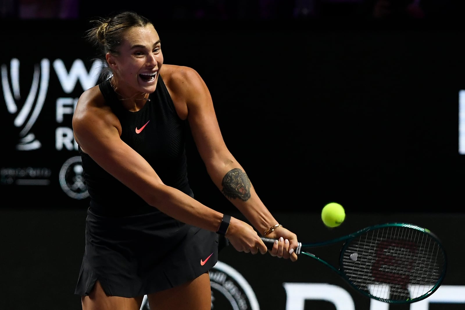 Belarus' Aryna Sabalenka in action during her women's singles semi final match against Coco Gauff of the U.S. at King Saud University Indoor Arena, in Riyadh, Saudi Arabia, Friday, Nov. 8, 2024. (AP Photo)