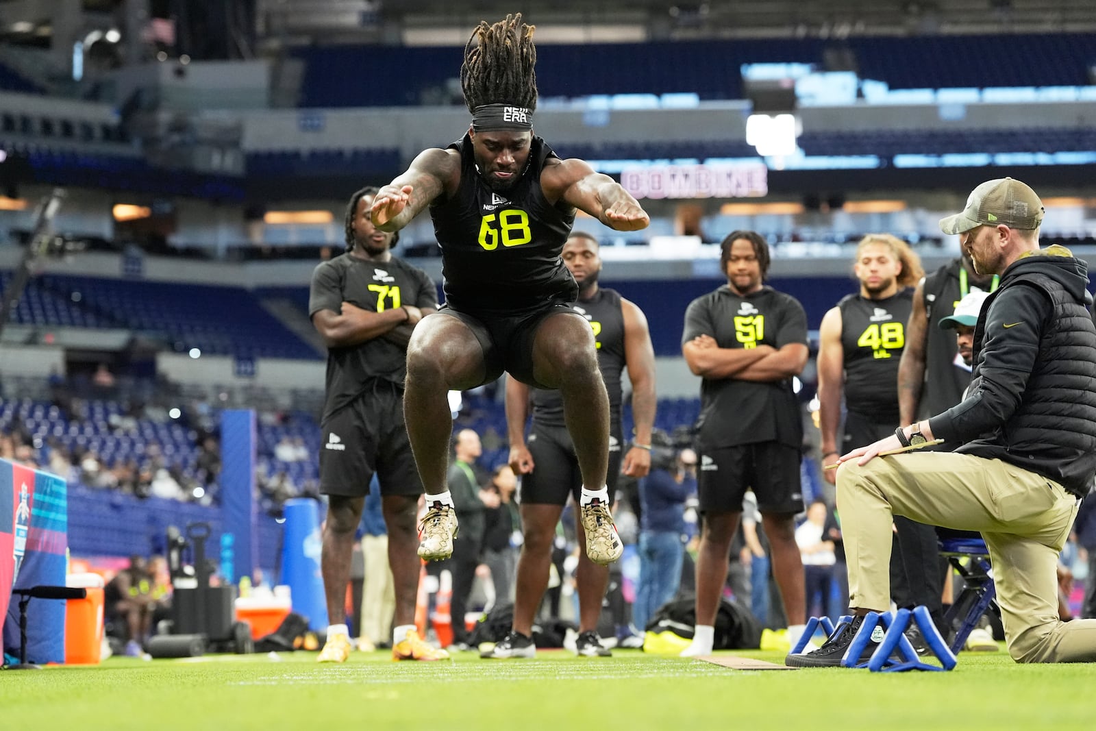 Texas A&M defensive lineman Shemar Stewart runs a drill at the NFL football scouting combine in Indianapolis, Thursday, Feb. 27, 2025. (AP Photo/George Walker IV)