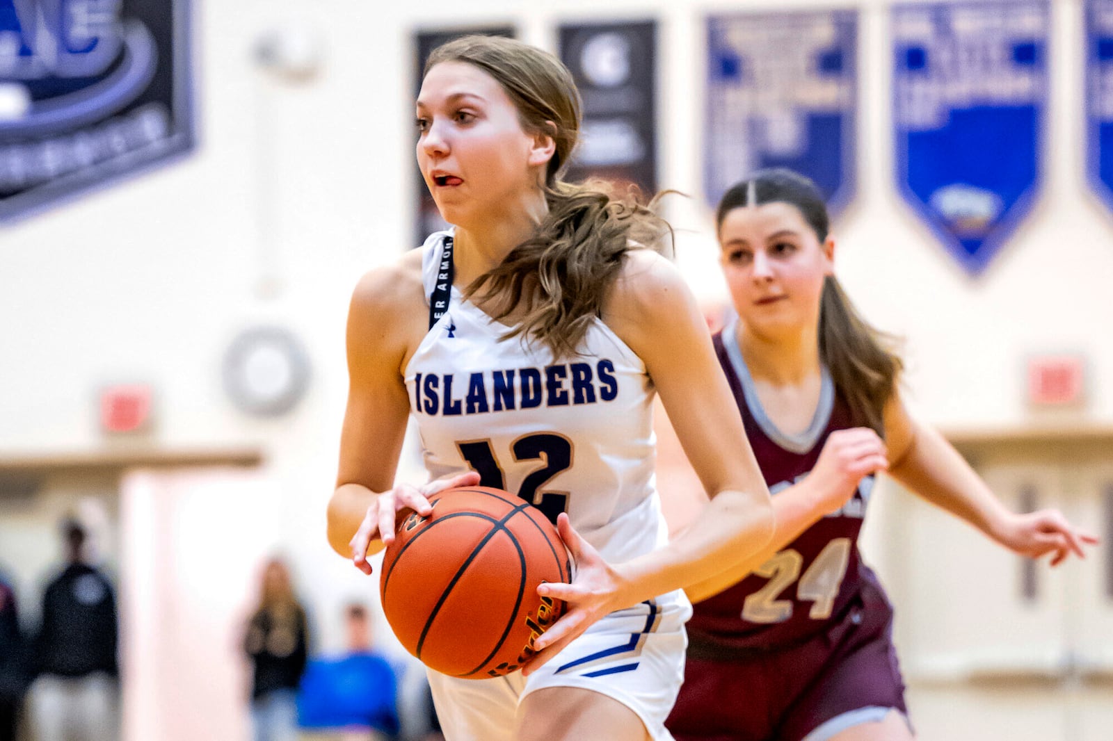 Grand Island High School's Lilly Goodwin dribbles during a girls high school basketball game against Norfolk High School, Jan. 26, 2024 in Grand Island, Neb. (Jimmy Rash/The Independent via AP)