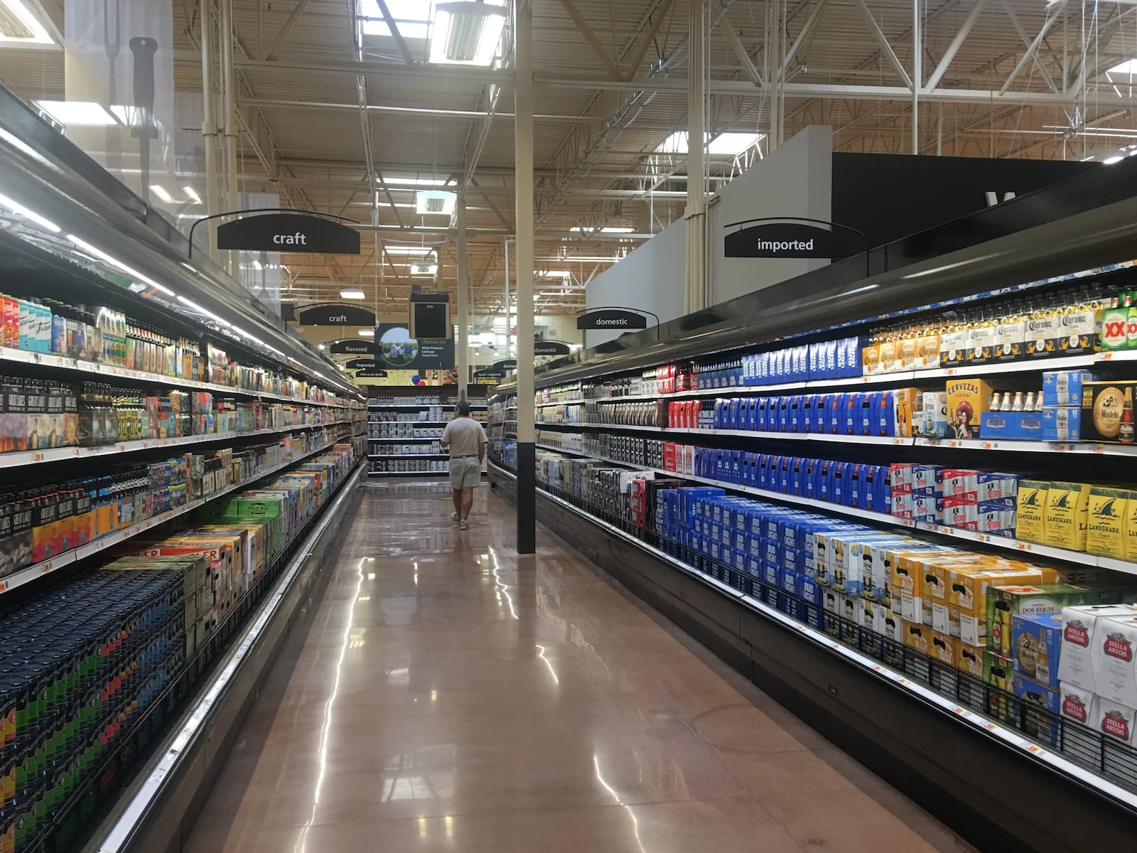 The new Kroger store at the Cornerstone of Centerville development has an extensive wine and beer selection for customers. KARA DRISCOLL/STAFF