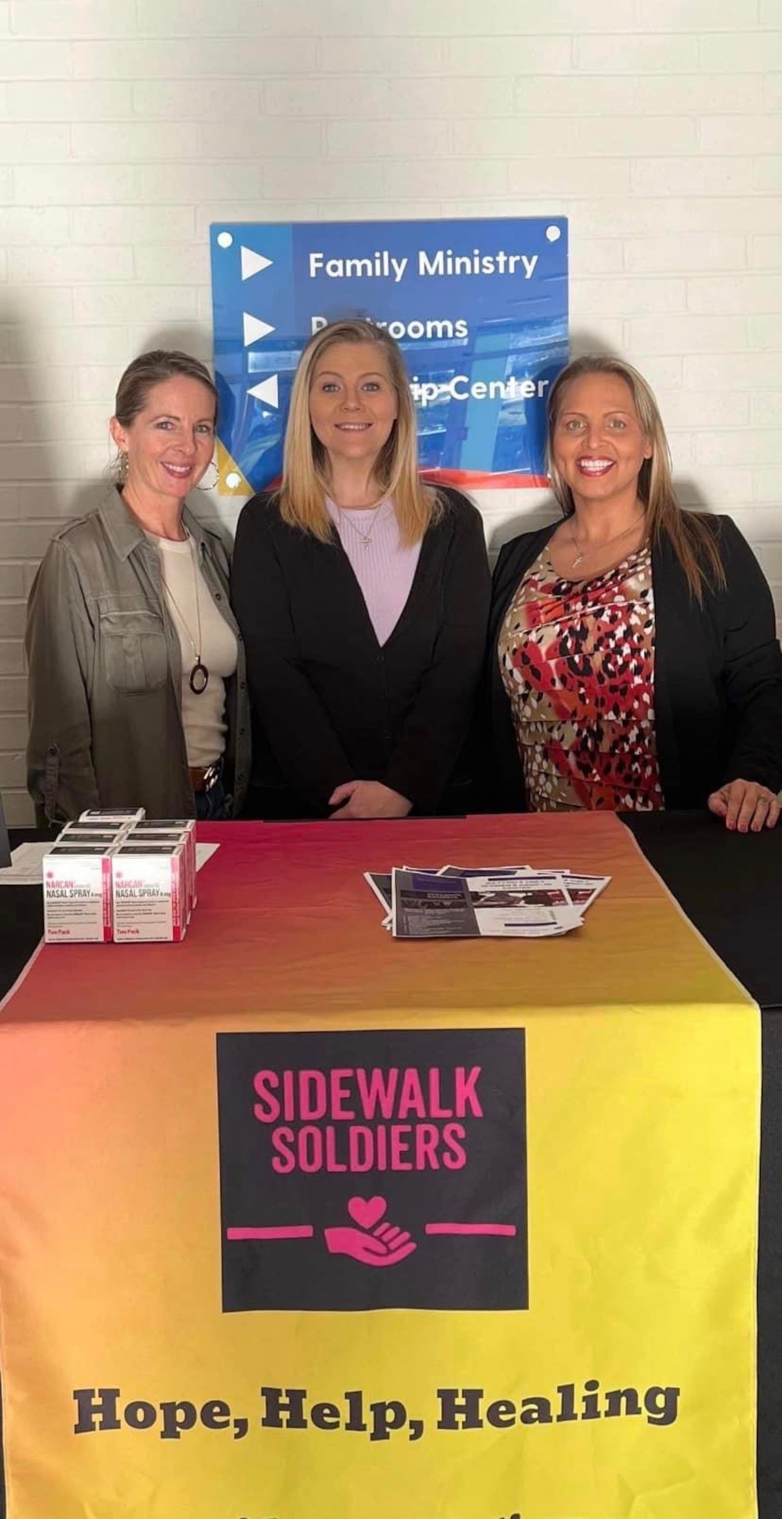 These three women are board members who serve Sidewalk Soldiers. One of them is a survivor of human trafficking. CONTRIBUTED